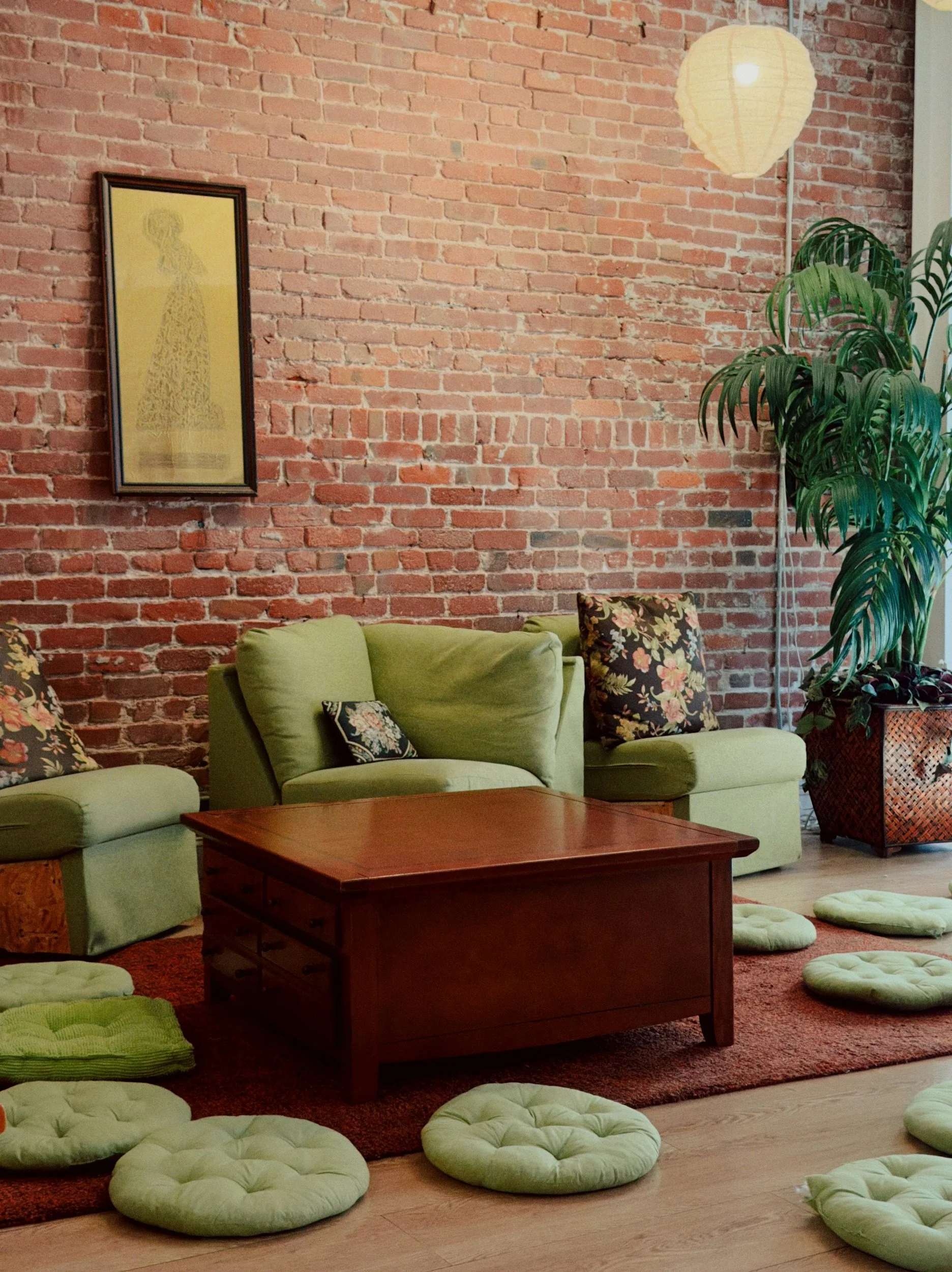MCM hard wood round table, green retro chairs Afrohemian Design aesthetic