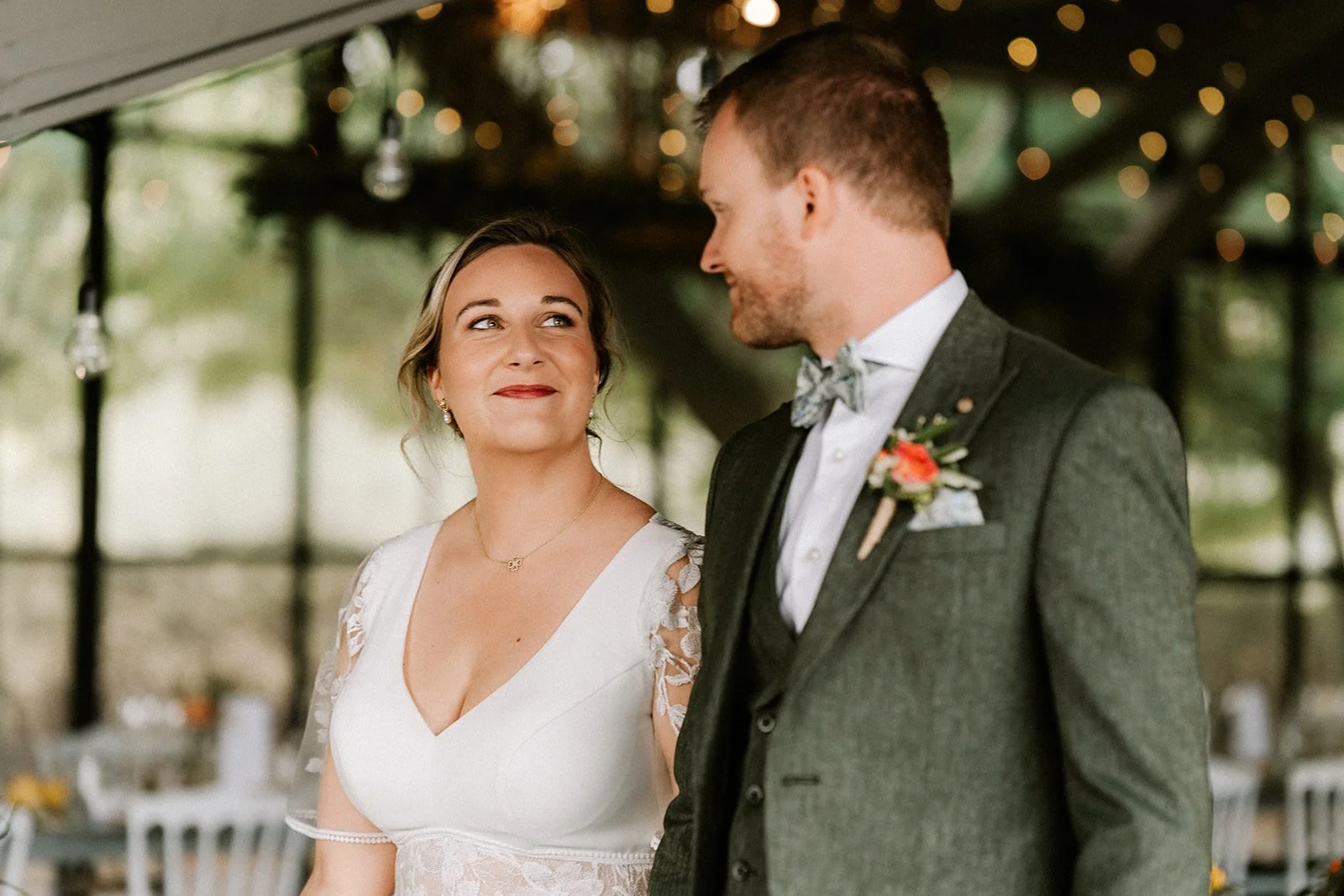 A wedding between glass and greenery