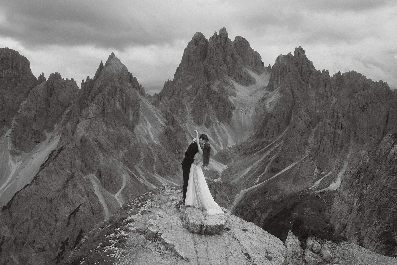 Cadini di Misurina elopement vows in the Dolomites with couple on a mountain ridge