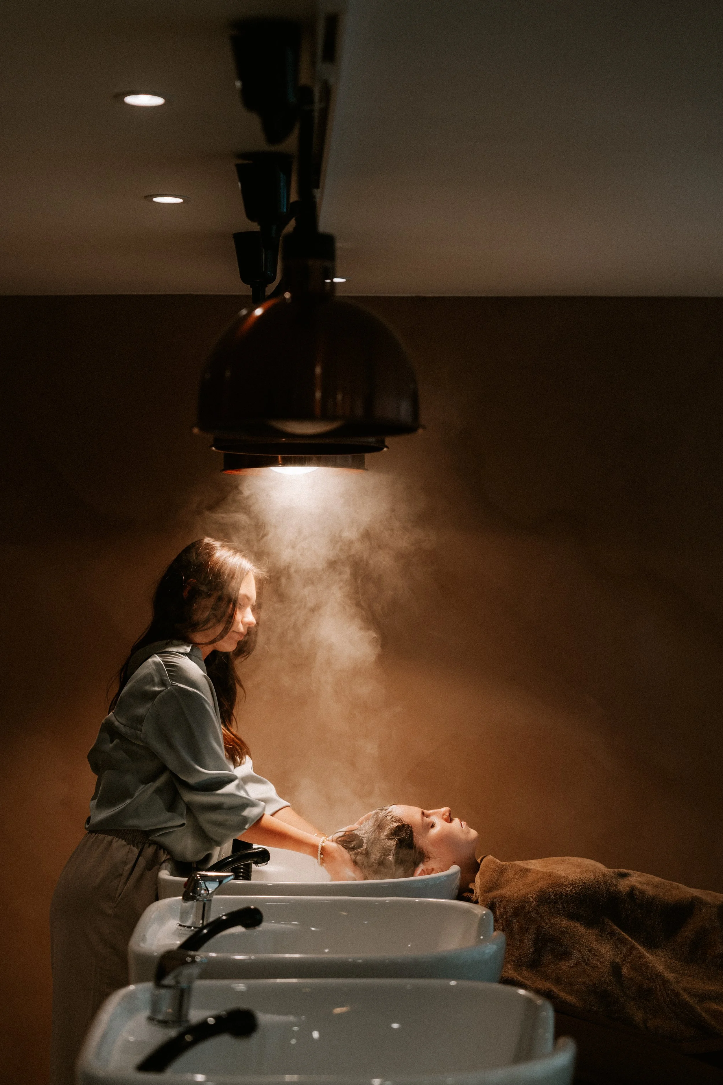 Branding images for an entrepreneur photographed at a hair salon