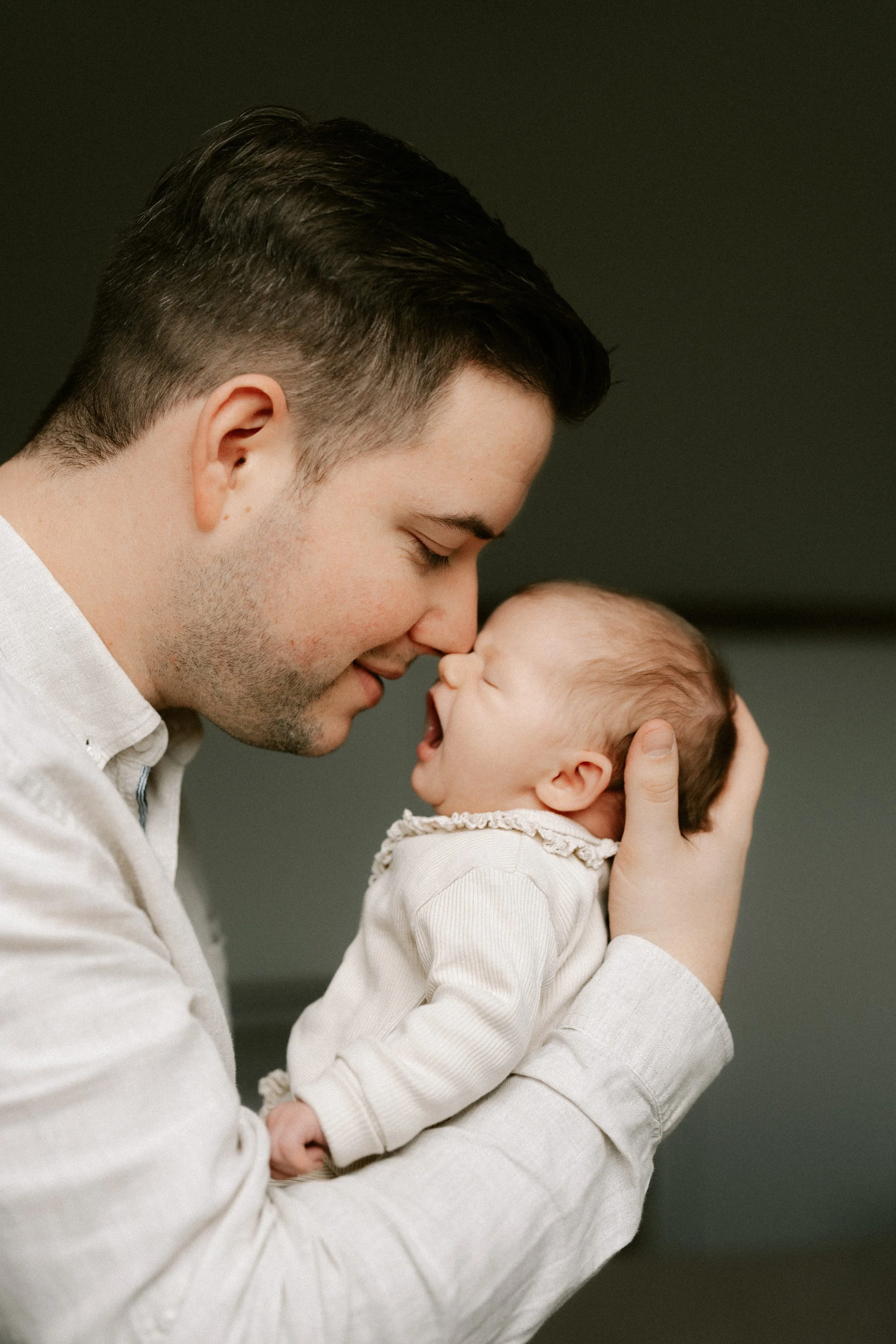 newborn resting peacefully during a home photoshoot