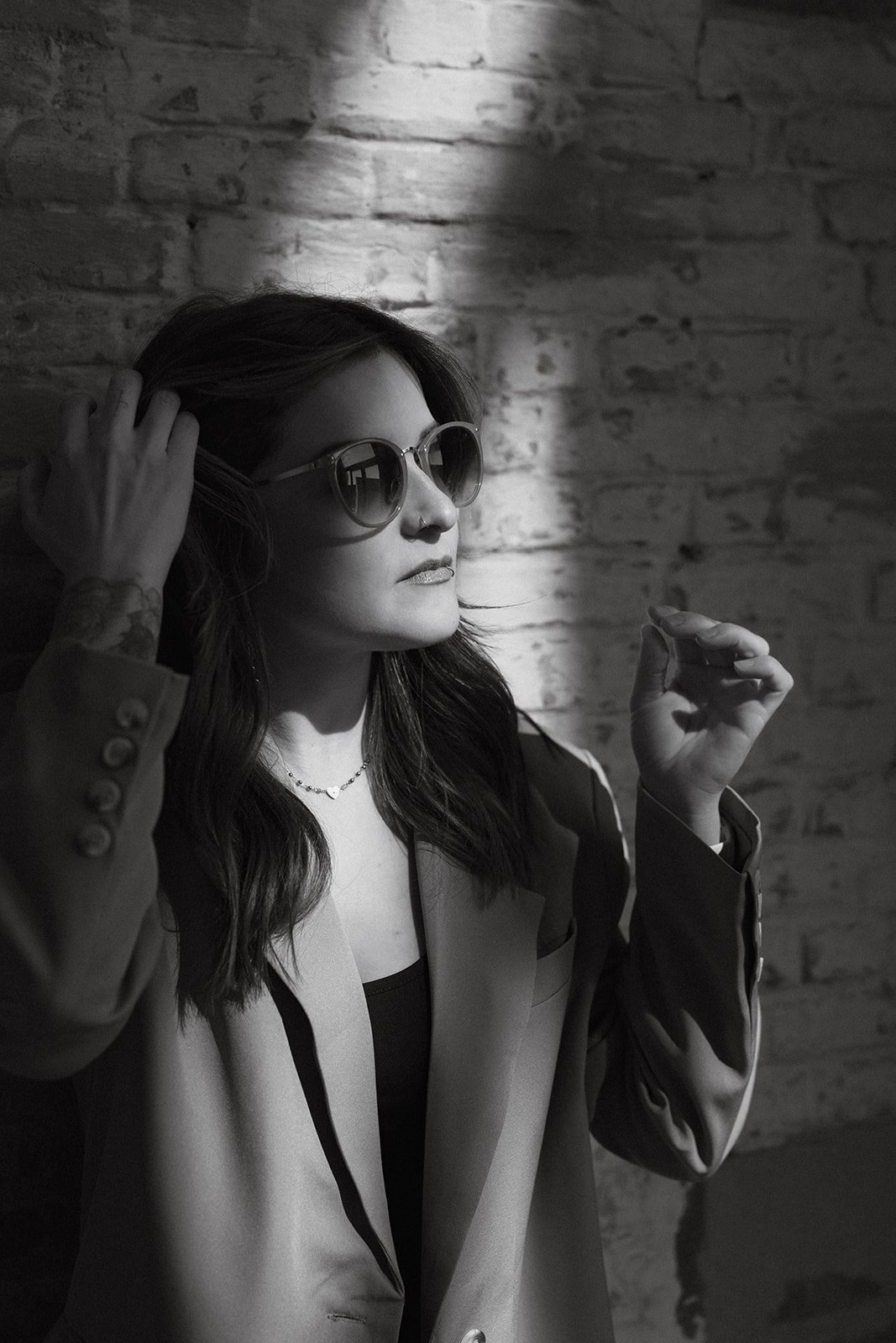 Minimalist studio portrait focused on presence and expression