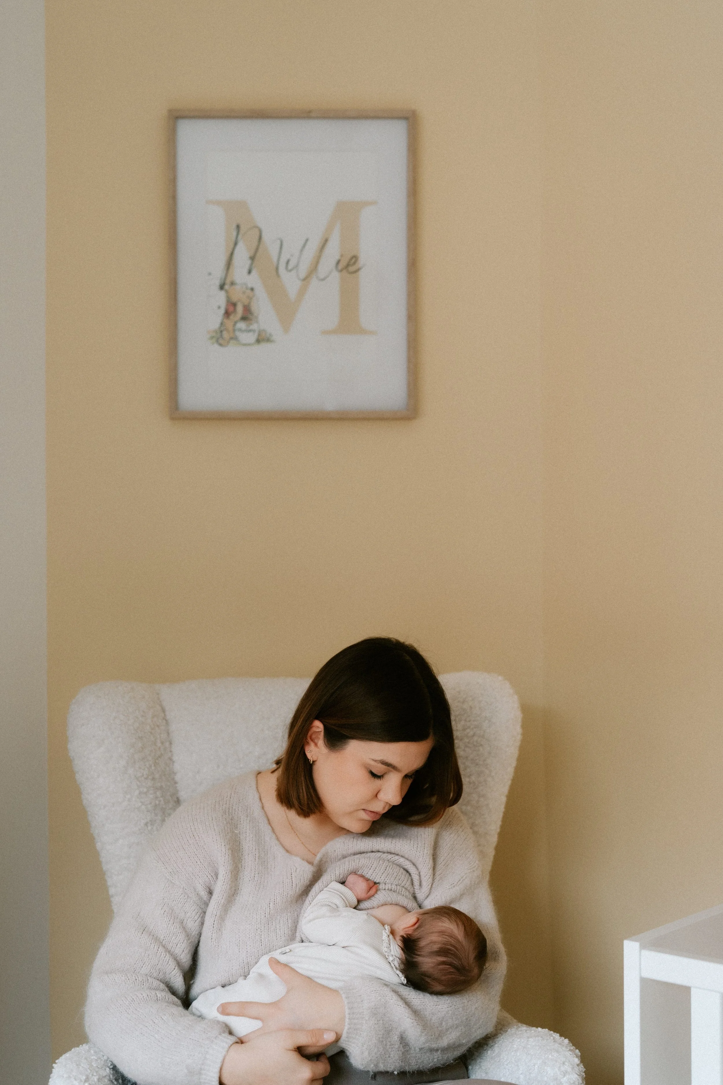 mother and newborn sharing a quiet moment at home