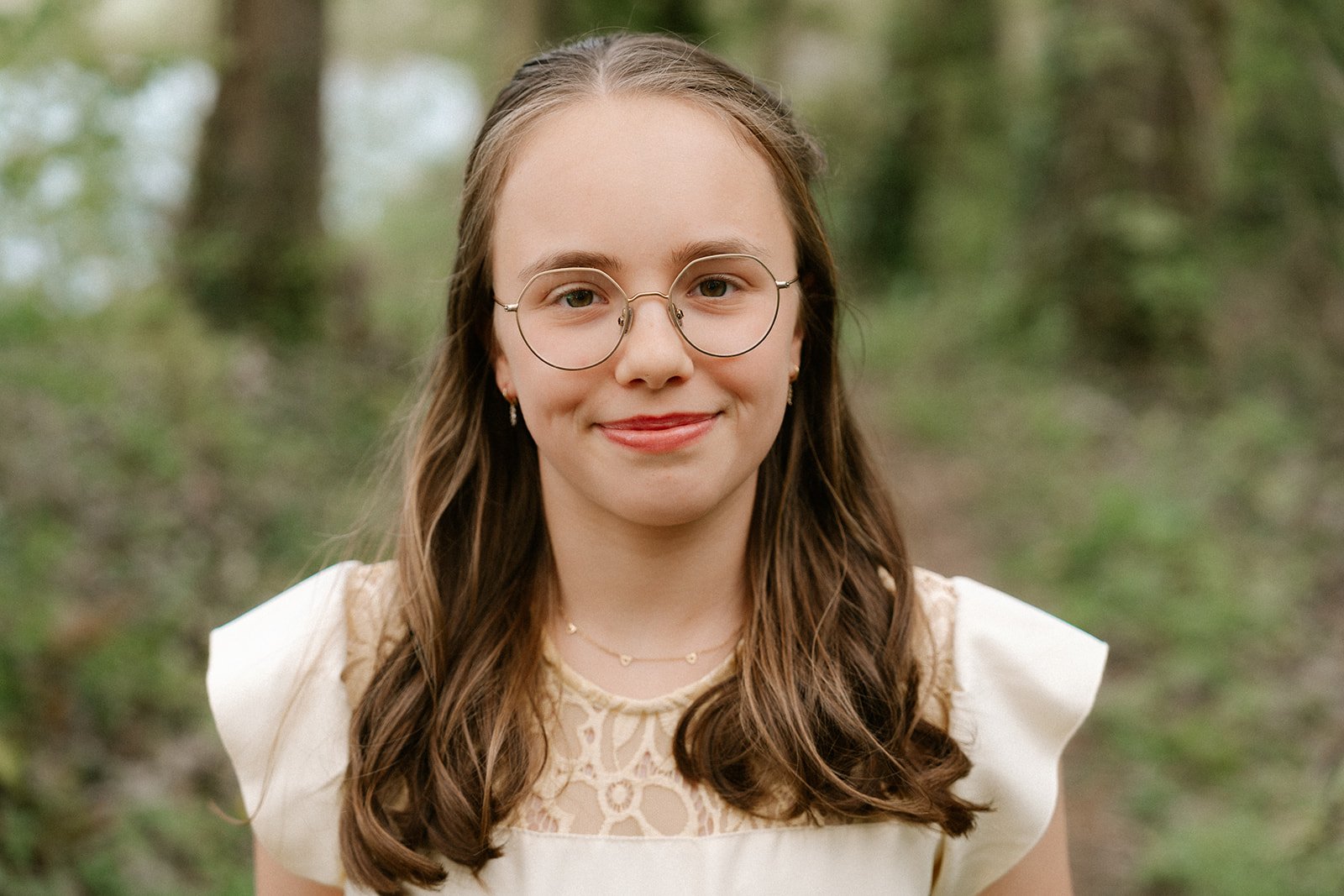 young girl smiling into the camera