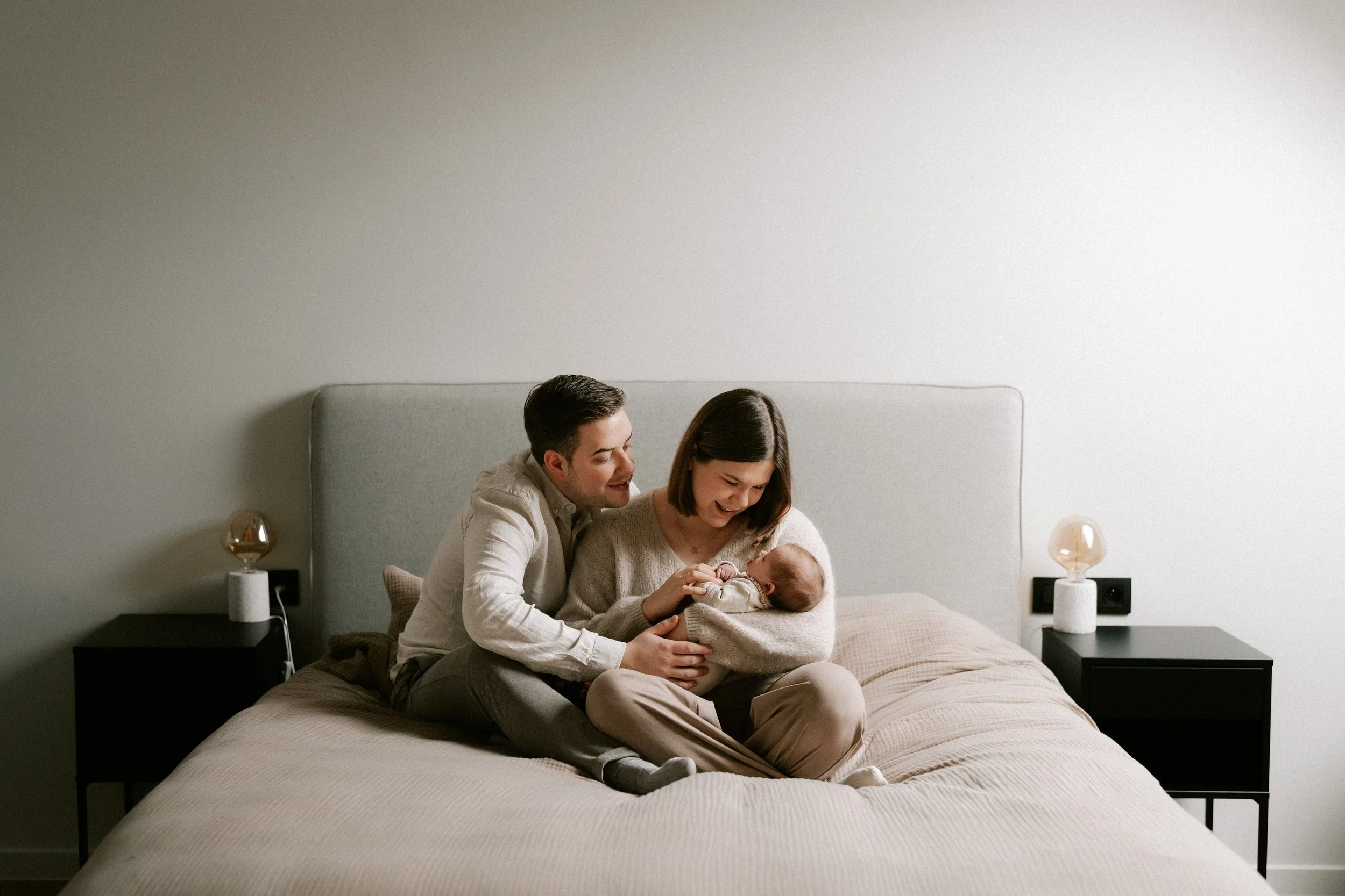intimate breastfeeding moment photographed at home