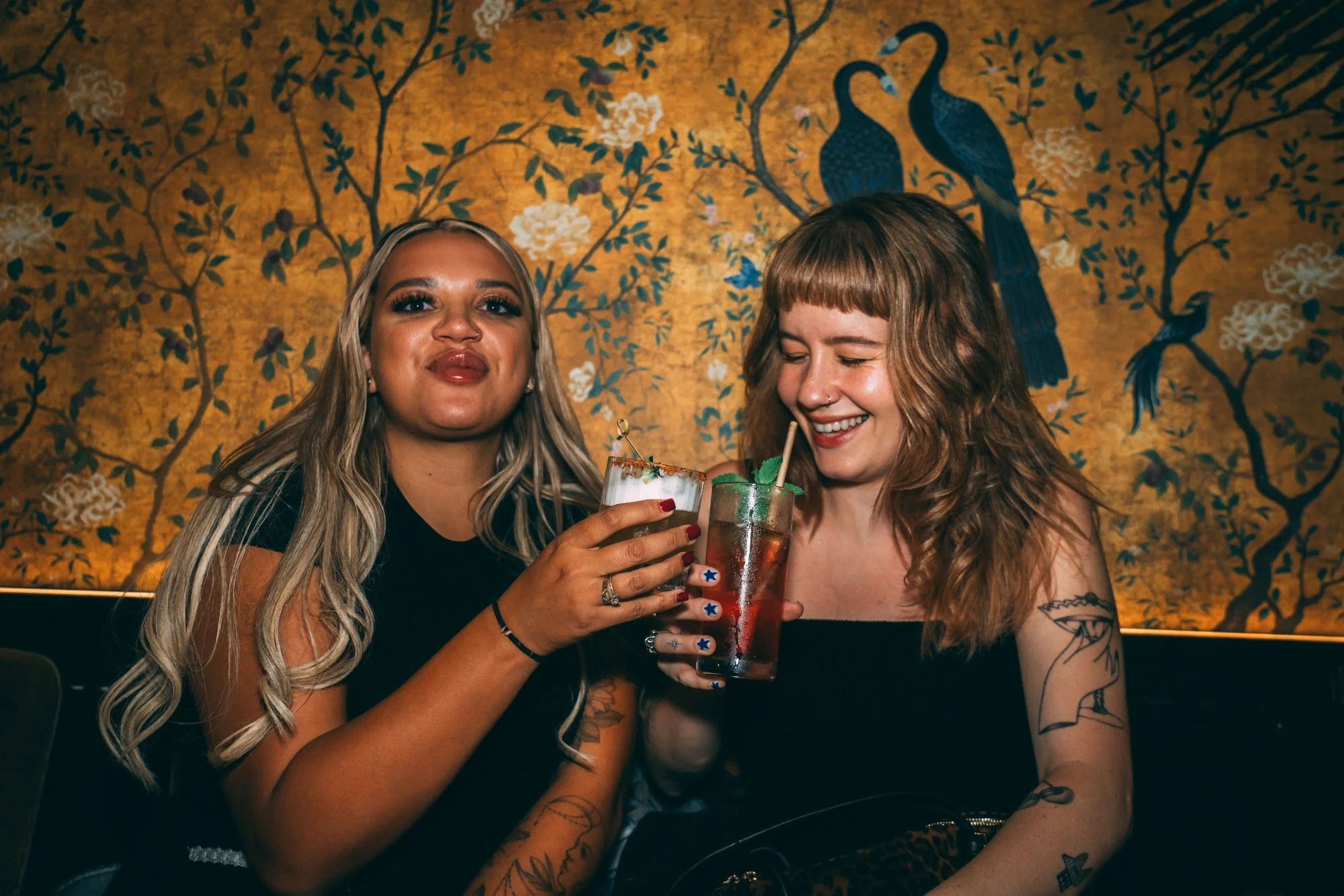 Two Brighton Cocktail Festival ticket holders enjoying their festival cocktails.