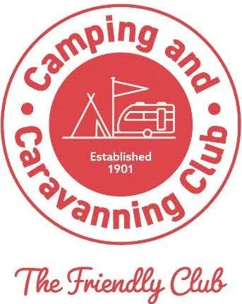 Logo of Camping and Caravanning Club with a tent, caravan, and flag inside a red circle, with text 'Established 1901' and underneath 'The Friendly Club'.