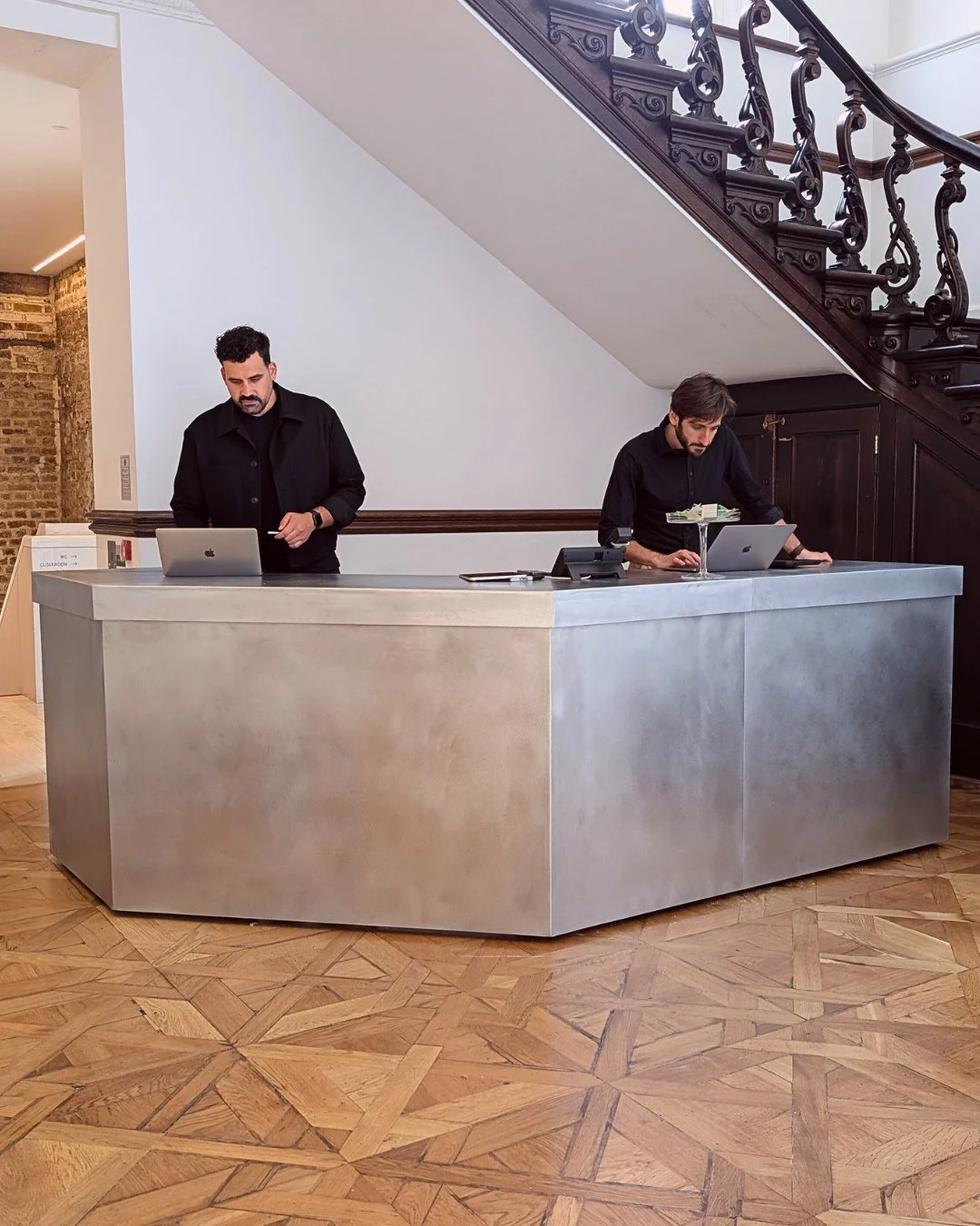 Studio NLM handcrafted this bespoke reception desk, finished in softly patinated zinc for a refined, sculptural look.⁠
⁠
Designed by @daytrip.studio, it anchors the entrance with quiet confidence, pairing craftsmanship with understated luxury.⁠
⁠
#St