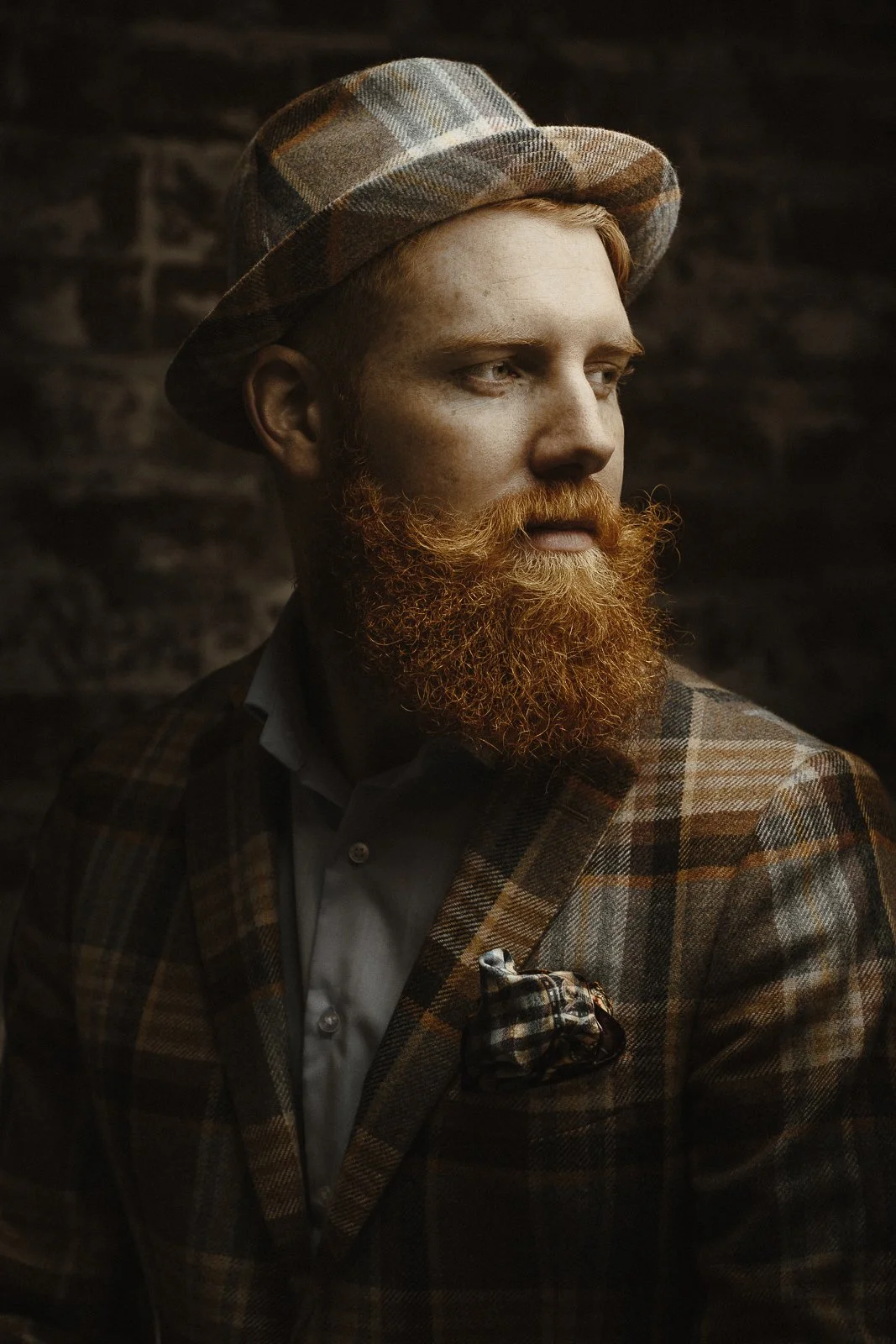 Dr. Jason Fox (aka foxwizard), a man with red beard in plaid suit and hat