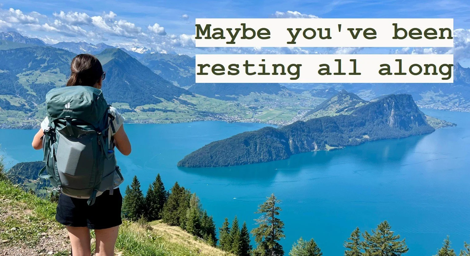 Shows Yvonne Durand with a backpack on the peak of a mountain enjoying the stunning landscape of mountains, blue sky, and lake. The statement on the photo reads: Maybe you've been resting all along.