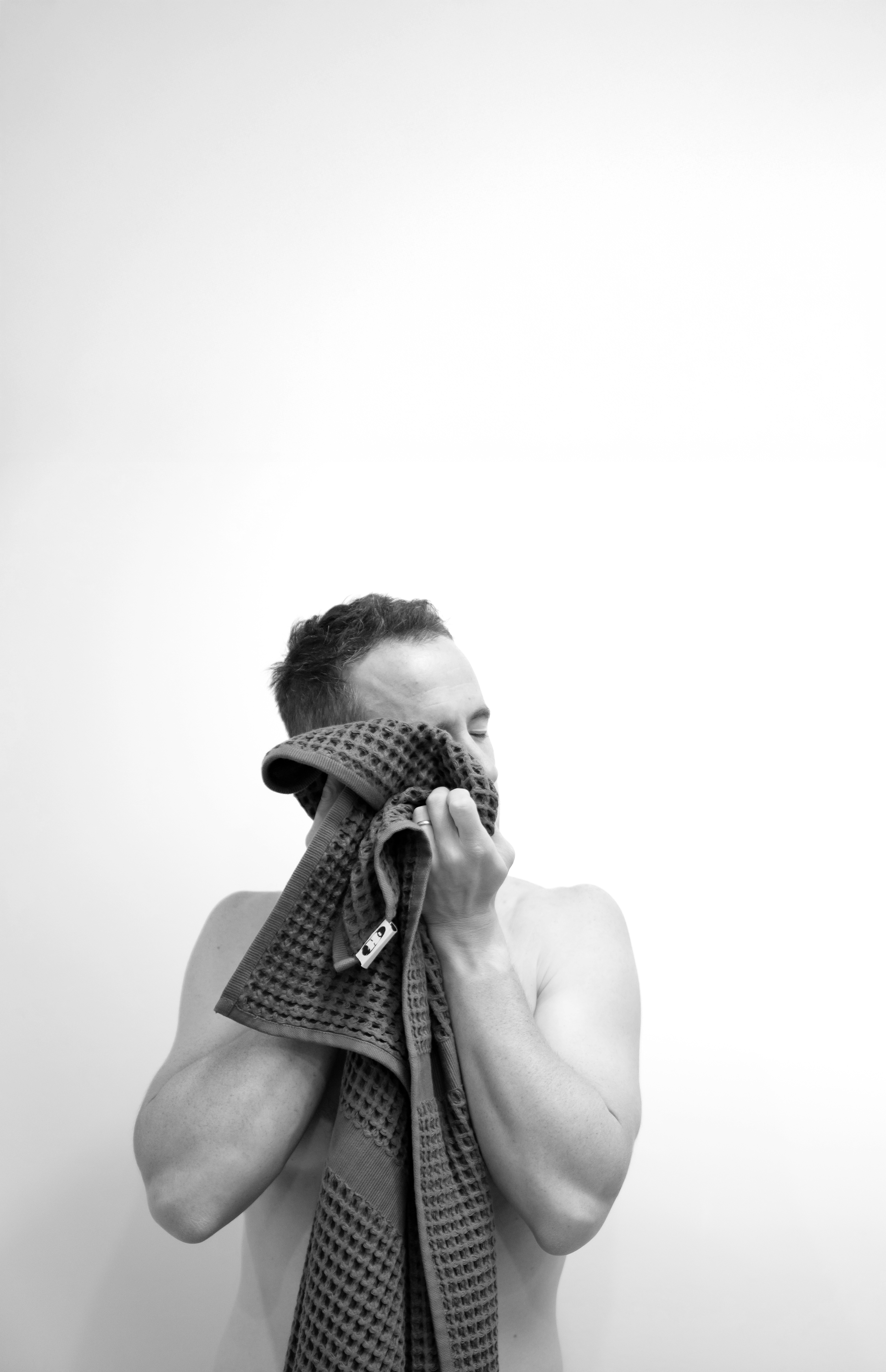 Man drying off with DudeTowel black and white photo