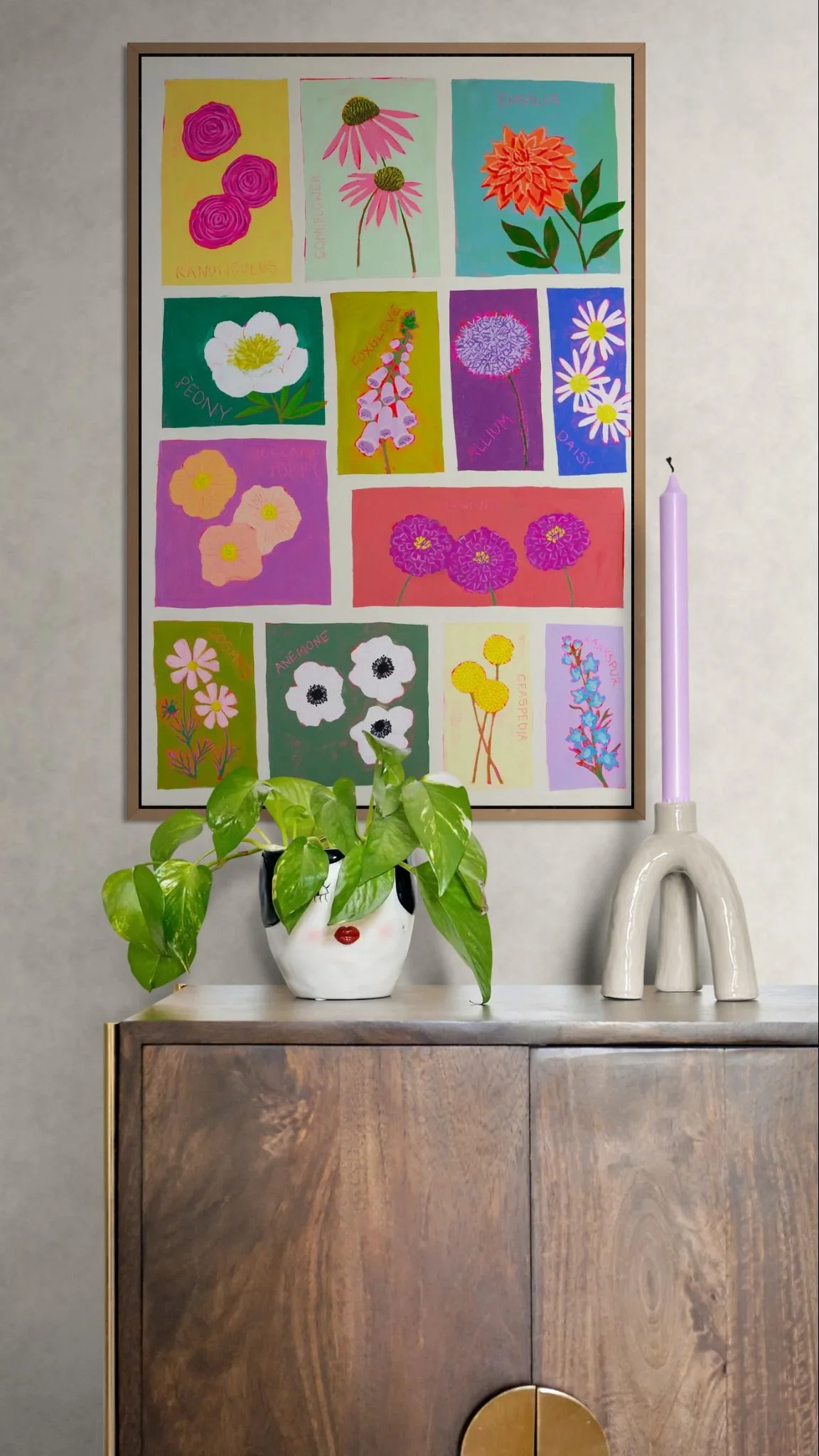 Wooden cabinet with plant and candle.jpeg