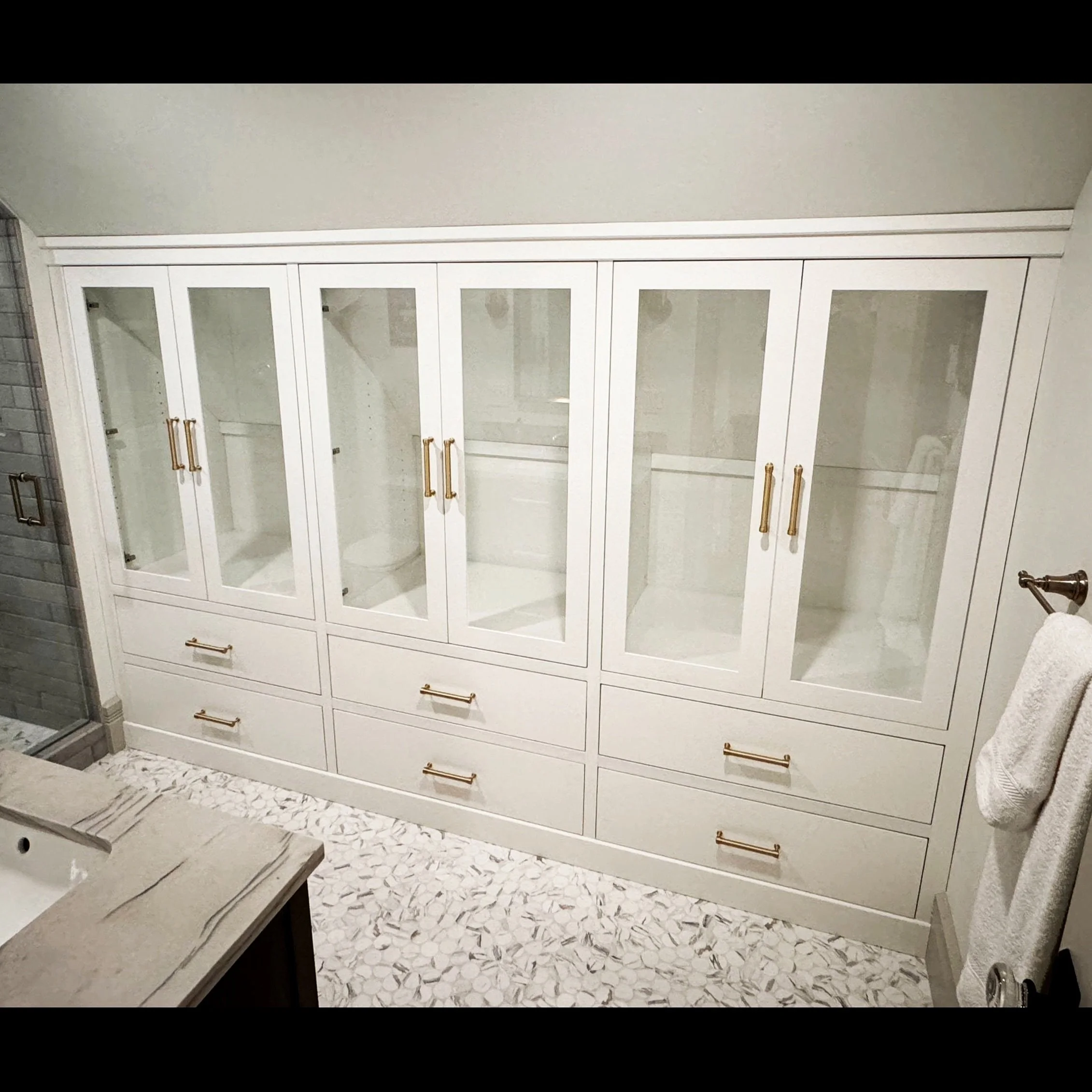 custom-built-in-linen-cabinet-glass-doors-durango.jpg