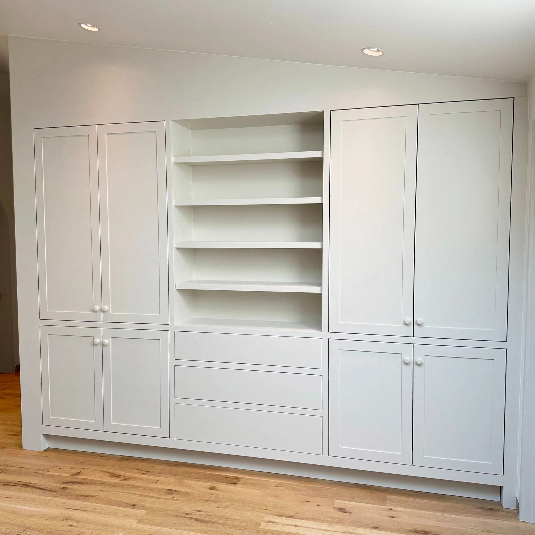 custom-white-built-in-linen-bookcase-cabinetry-durango.jpg