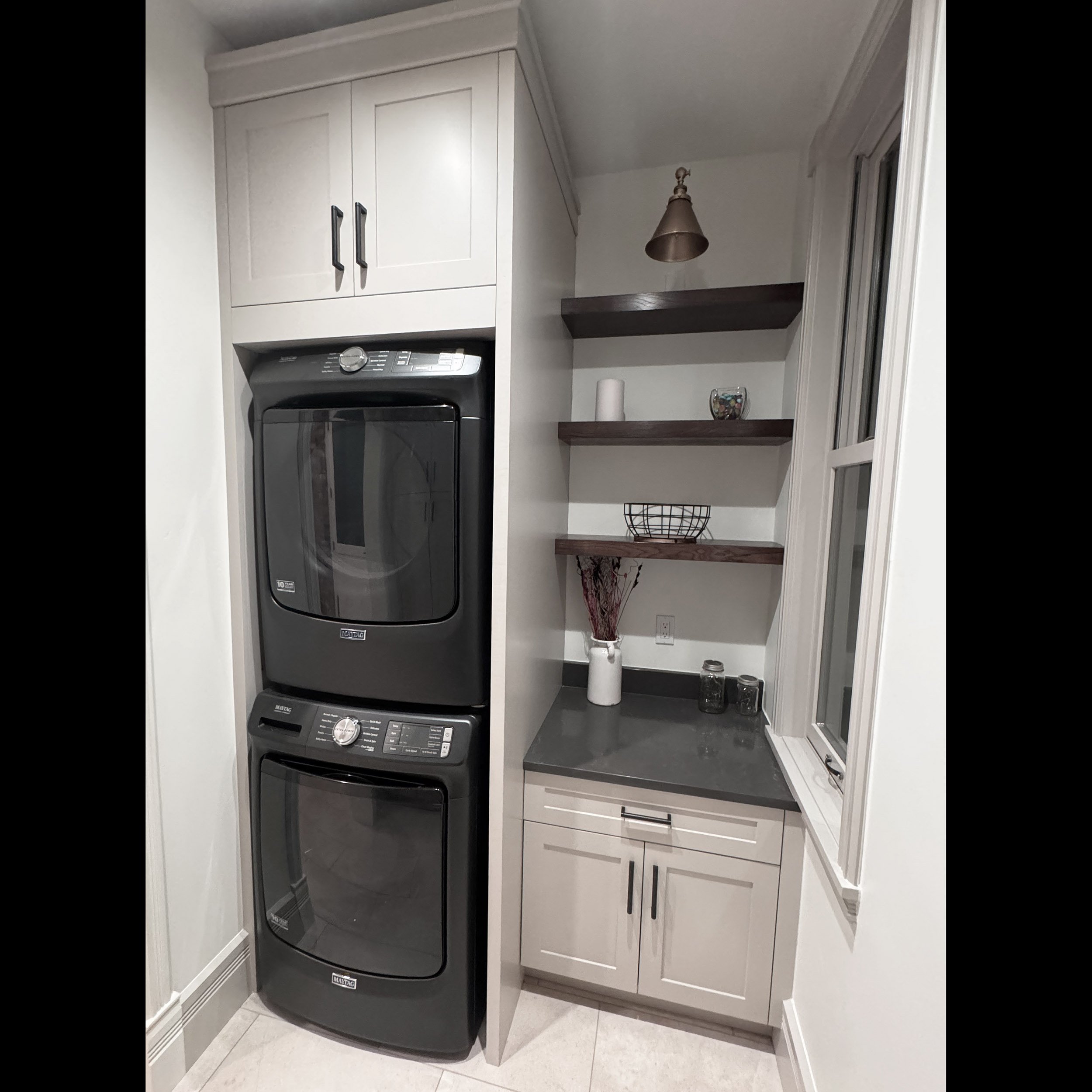 custom-built-in-laundry-room-cabinetry-oak-floating-shelves-durango.jpg