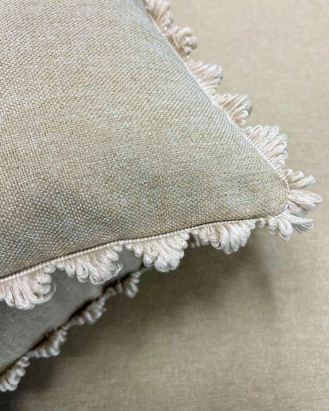 Handmade cushion stack with Laura Ashley trim details