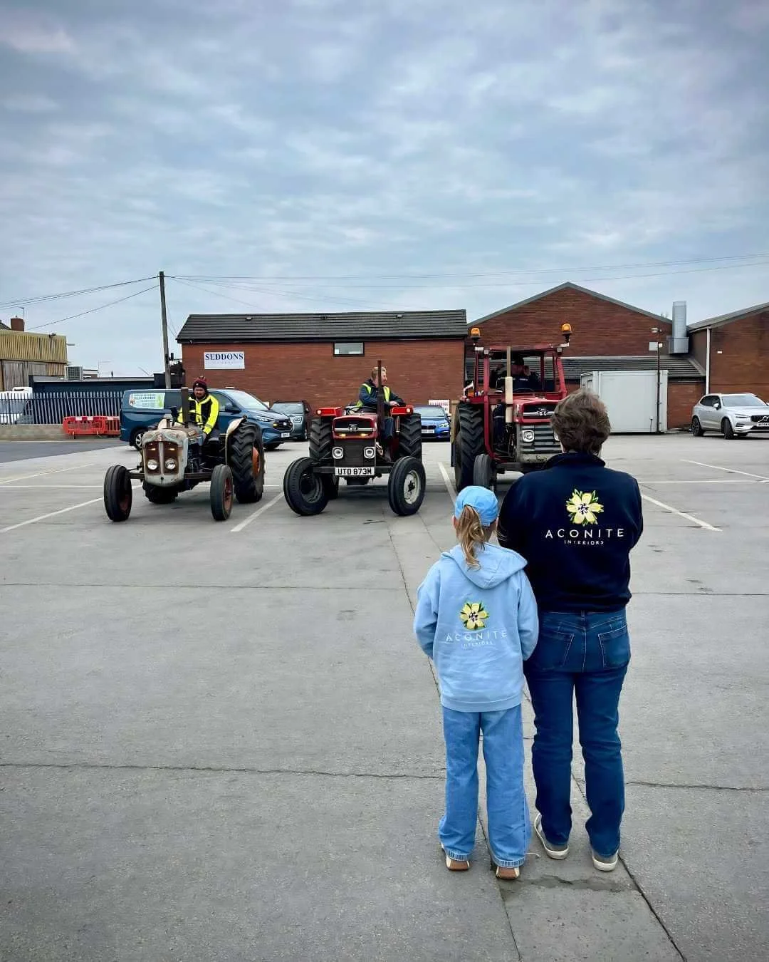 alison-and-daisy-may-cheering-on-tractors.jpg