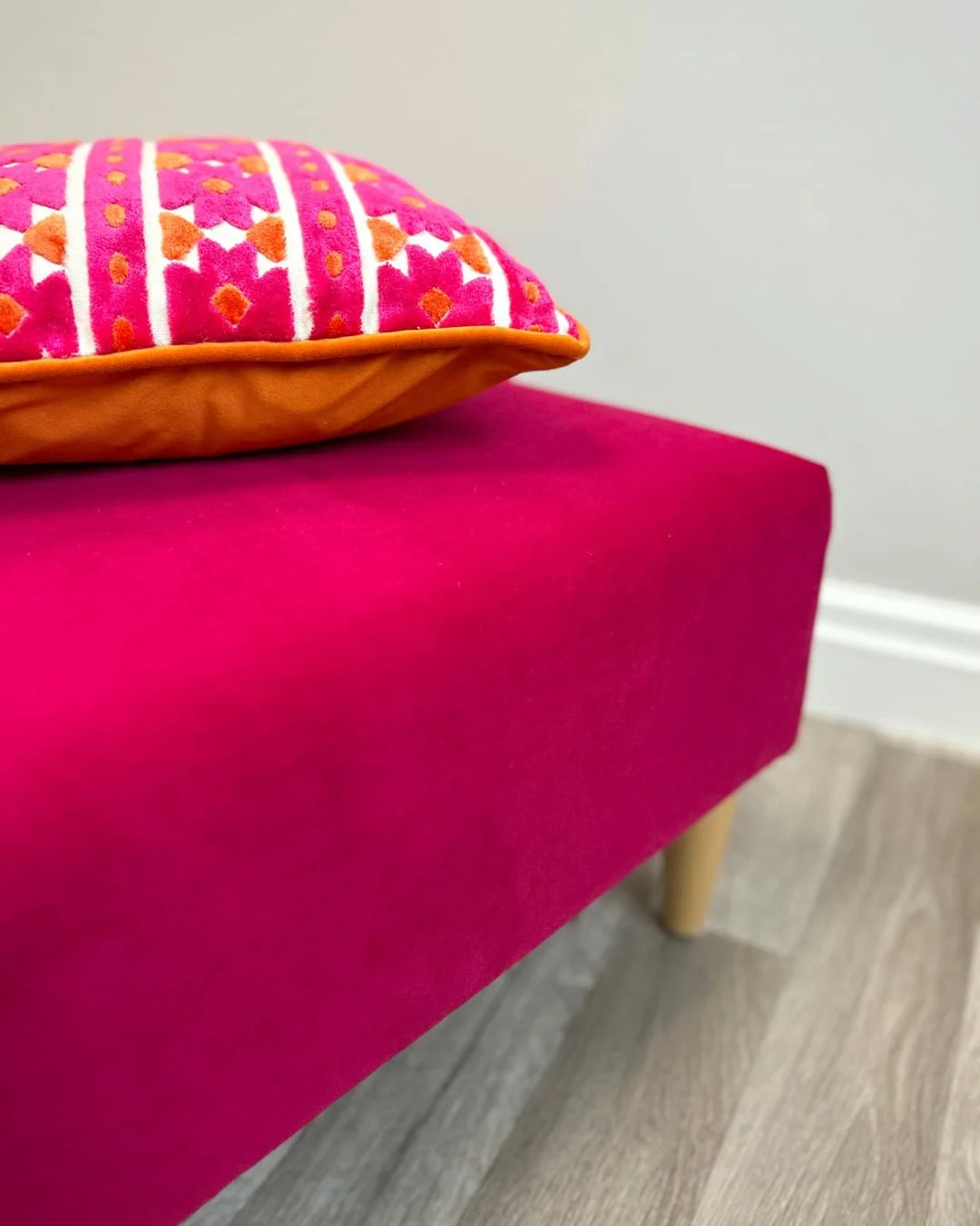 bright-pink-velvet-bespoke-upholstered-footstool-and-colour-coordinated-cushion.jpg