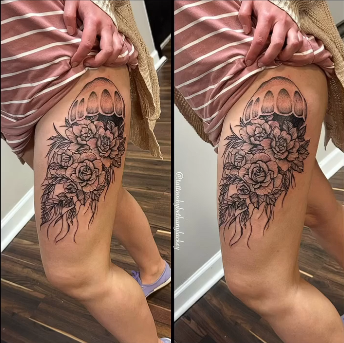 What says whimsy more than a jellyfish made of peonies. This design is well balanced with black and skin and properly placed on the thigh to flow.