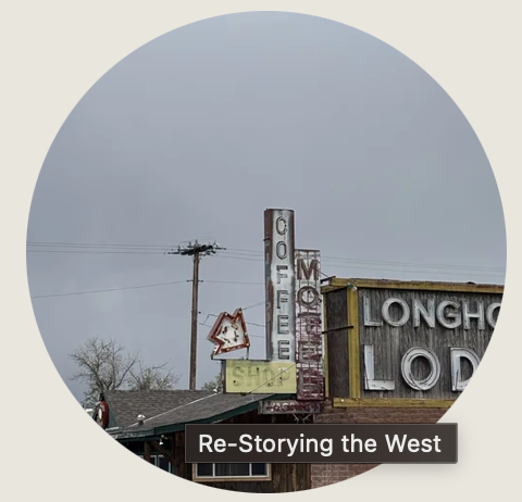 Cheyenne- A vintage roadside sign displays “Coffee Shop,” “Motel,” and “Longhorn Lodge” in bold weathered letters. The worn paint and muted colors evoke the nostalgia of mid-century travel stops along Wyoming’s open highways.