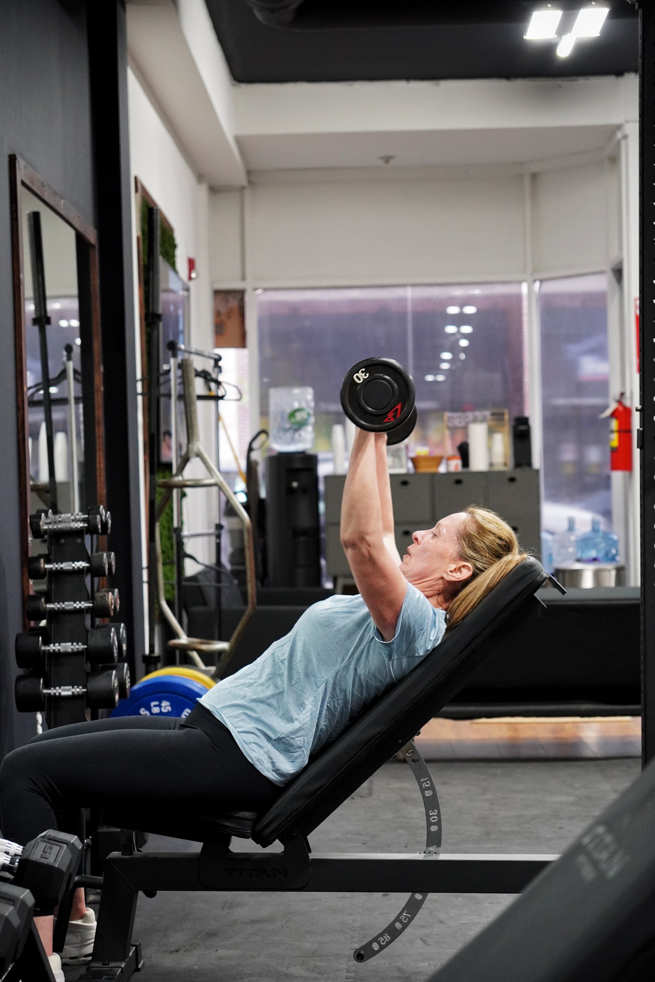 A member at EMBODI Fitness participating in a small group training session.