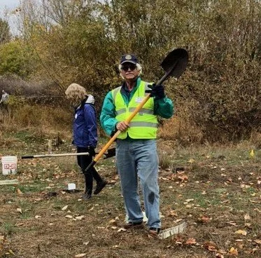 One of those motivated volunteers ready to make another planting!