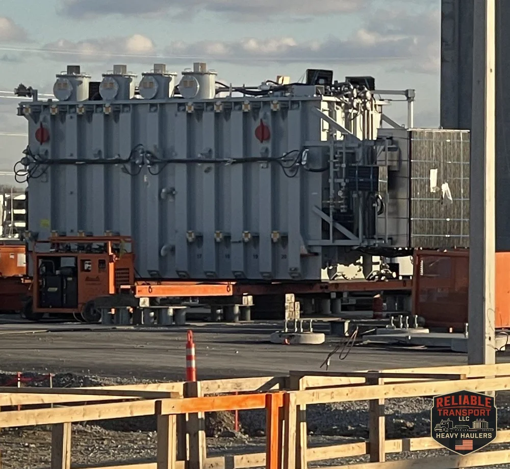 The 160,000 lb transformer on rigging equipment at the Obetz, Ohio site in late afternoon light