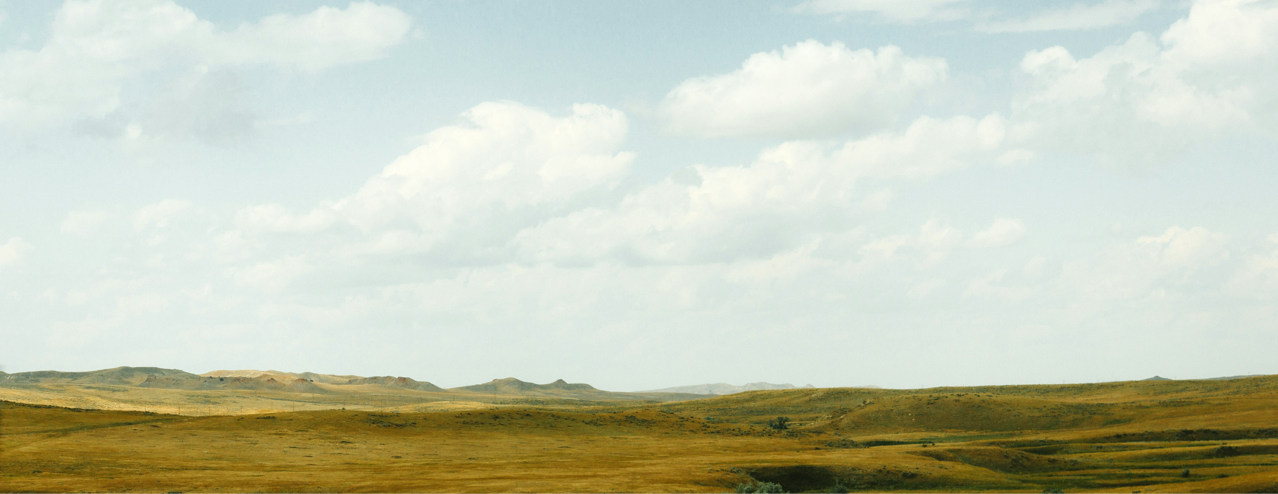 Vast open plains landscape representing the expansive tribal lands across Indian Country where SGE supports energy sovereignty and utility development