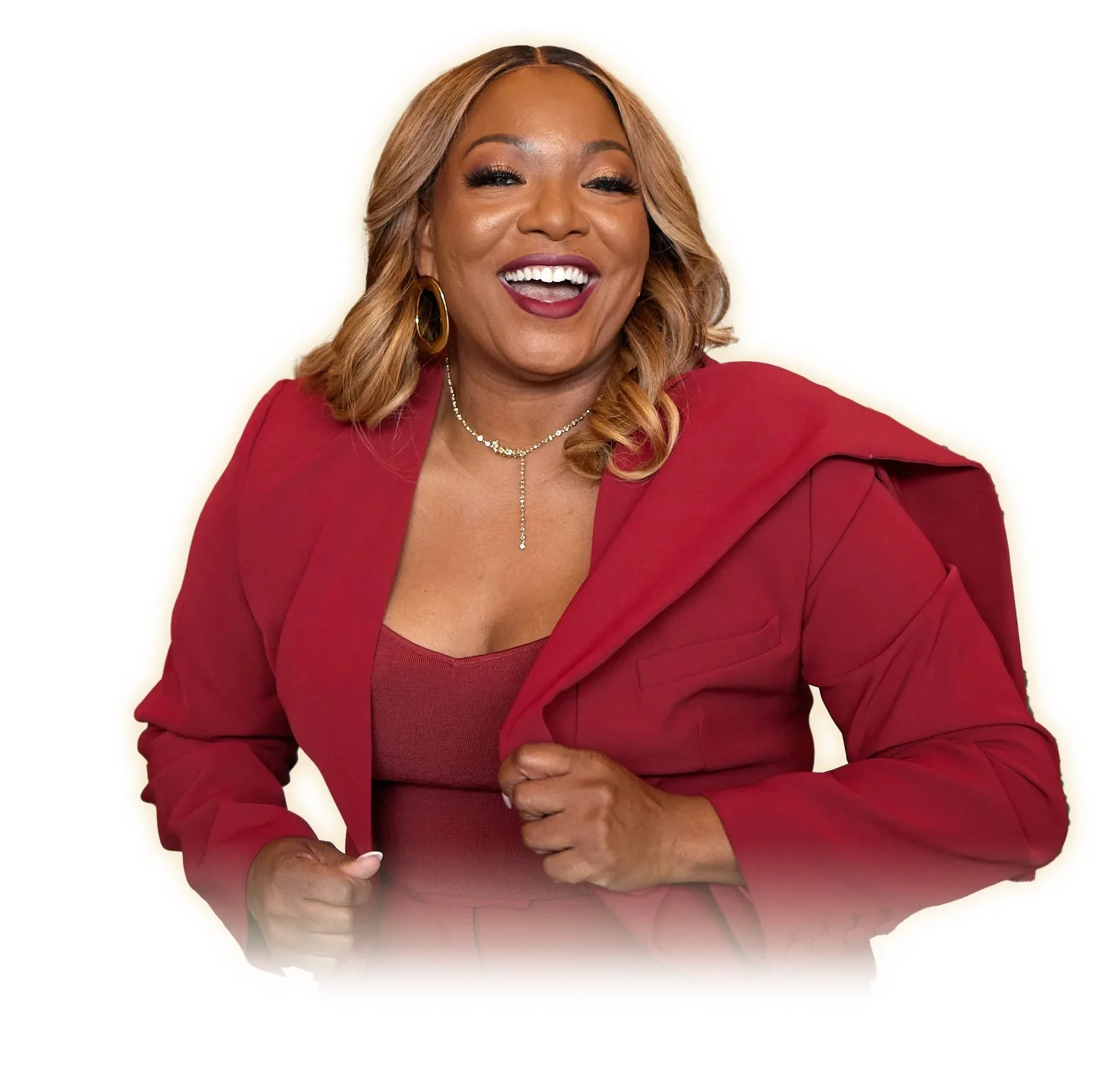 Woman smiling in a red suit jacket