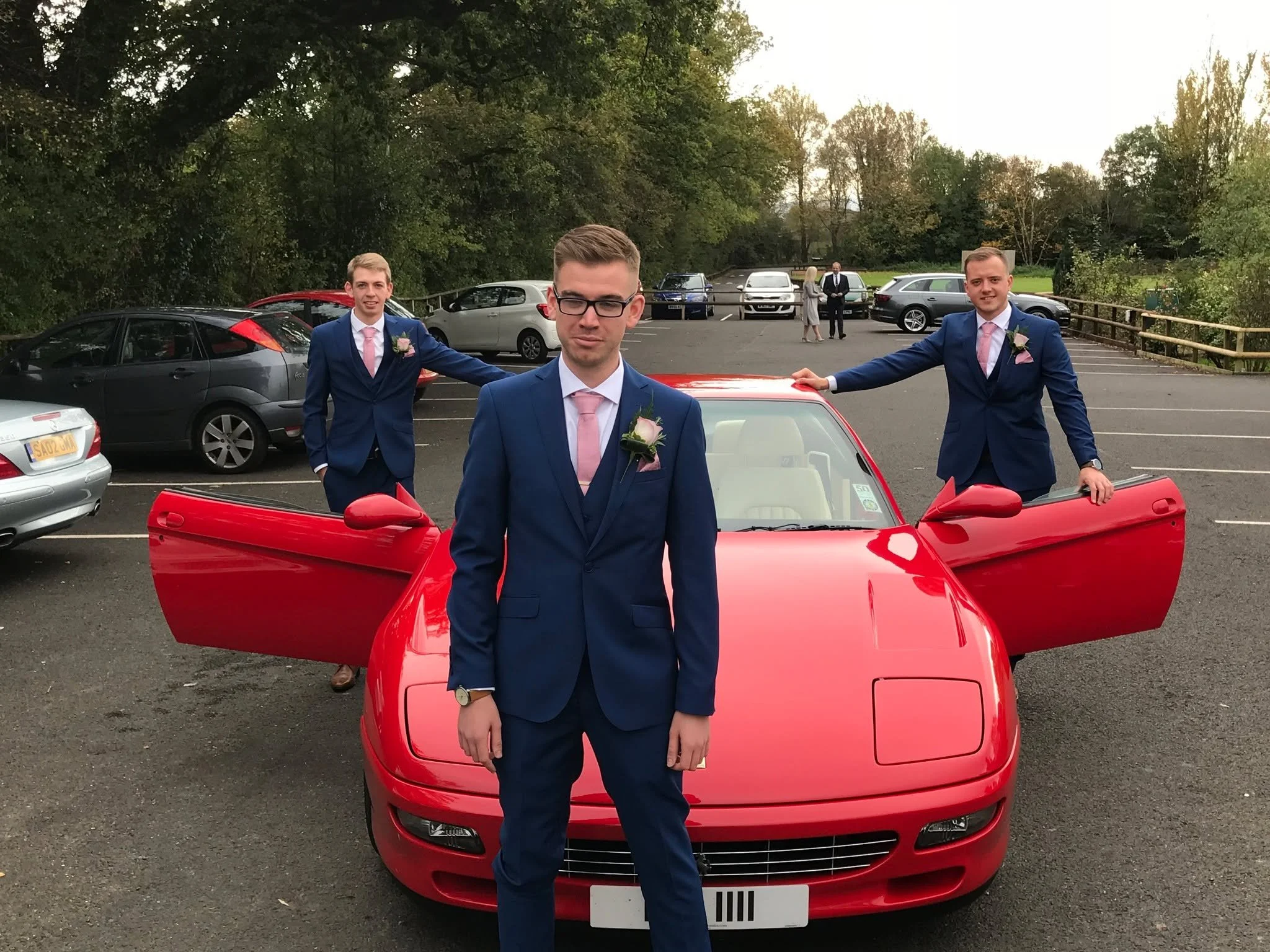 Want some special wedding transport for your groom to arrive in style ?
and as a background for your photos ?
or for the happy couple to ride away in ?

we have you covered, with a Racing Red V12 Ferrari and a luscious blue V8 Ford Mustang

let us kn