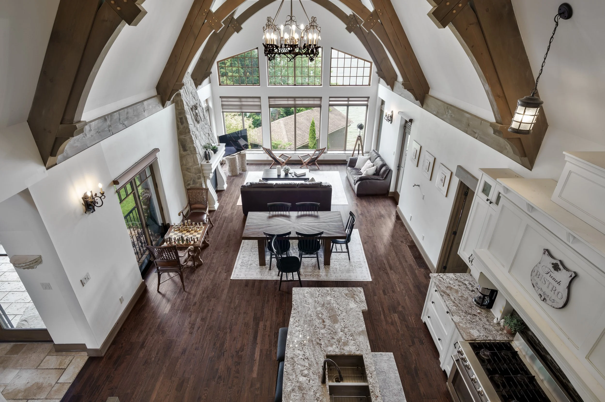 Open concept luxury chalet featuring cathedral ceilings in Brock - Premium  Real Estate Photography