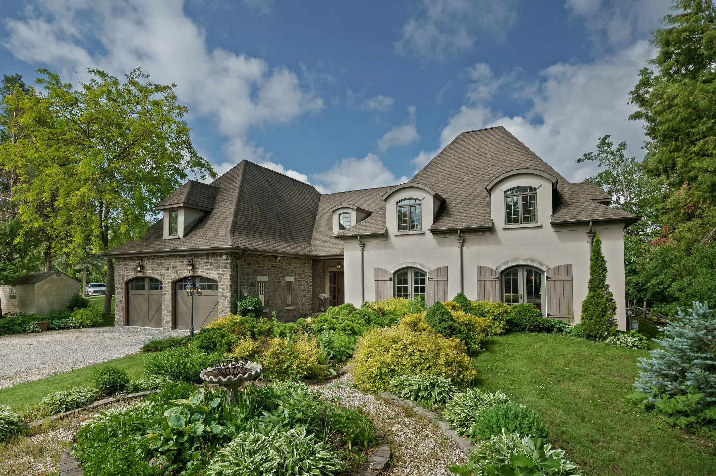 Exterior of a luxury lakefront property in Beaverton - Real Estate Photography
