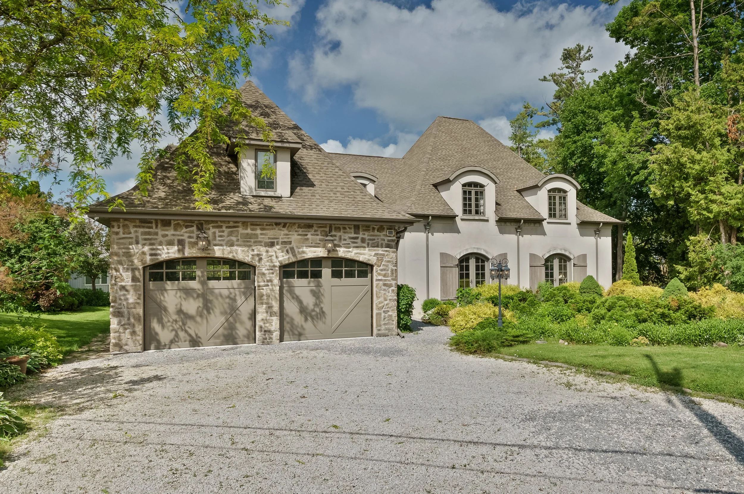 Exterior of a luxury lakefront property in Beaverton - Real Estate Photography