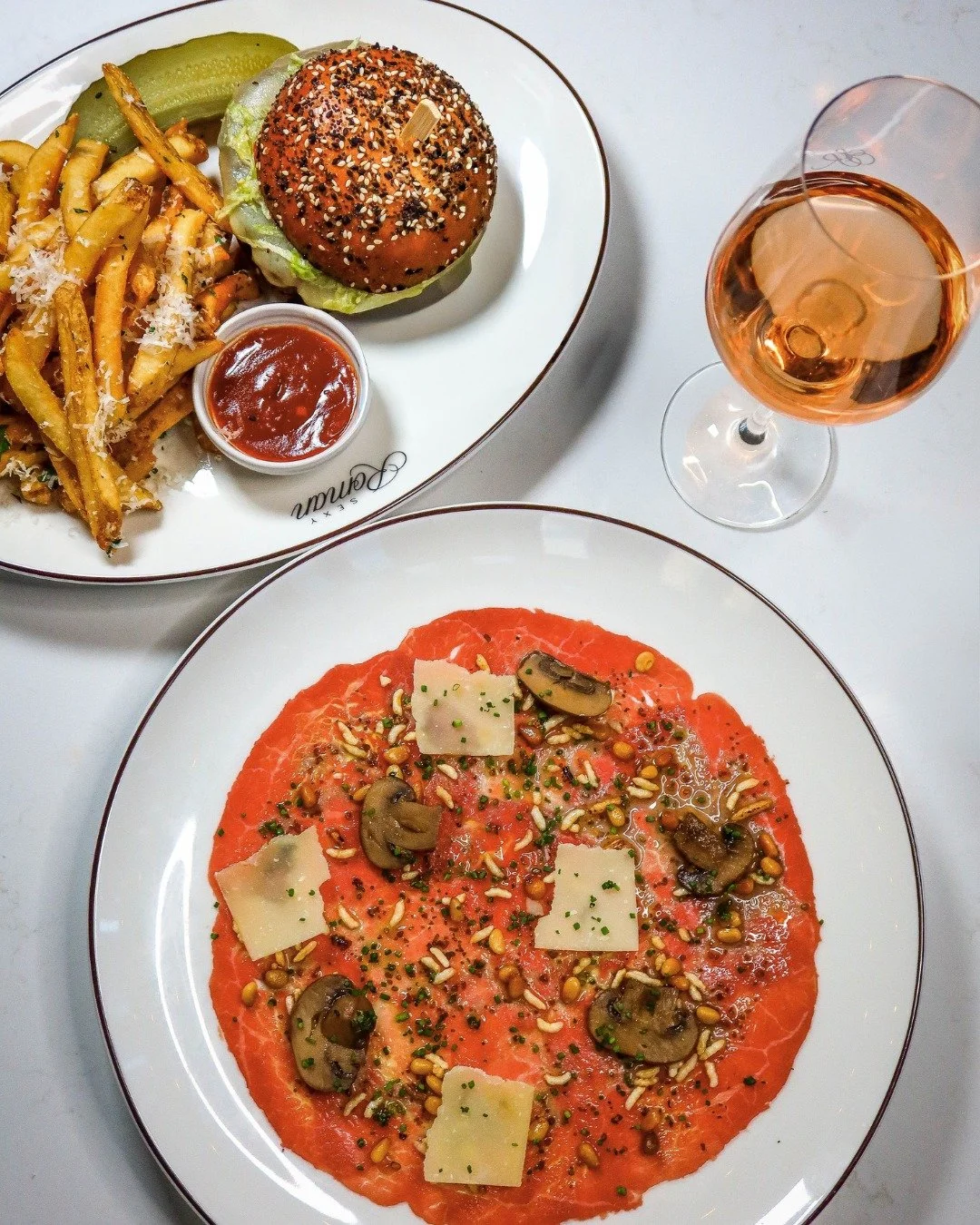 Lunch doesn’t get more irresistible. Wagyu Carpaccio, The Roman Burger, and rosé on repeat.