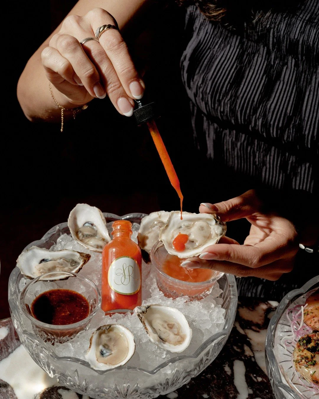 Seduction on ice. 🦪 A half dozen oysters with our signature fermented hot sauce.