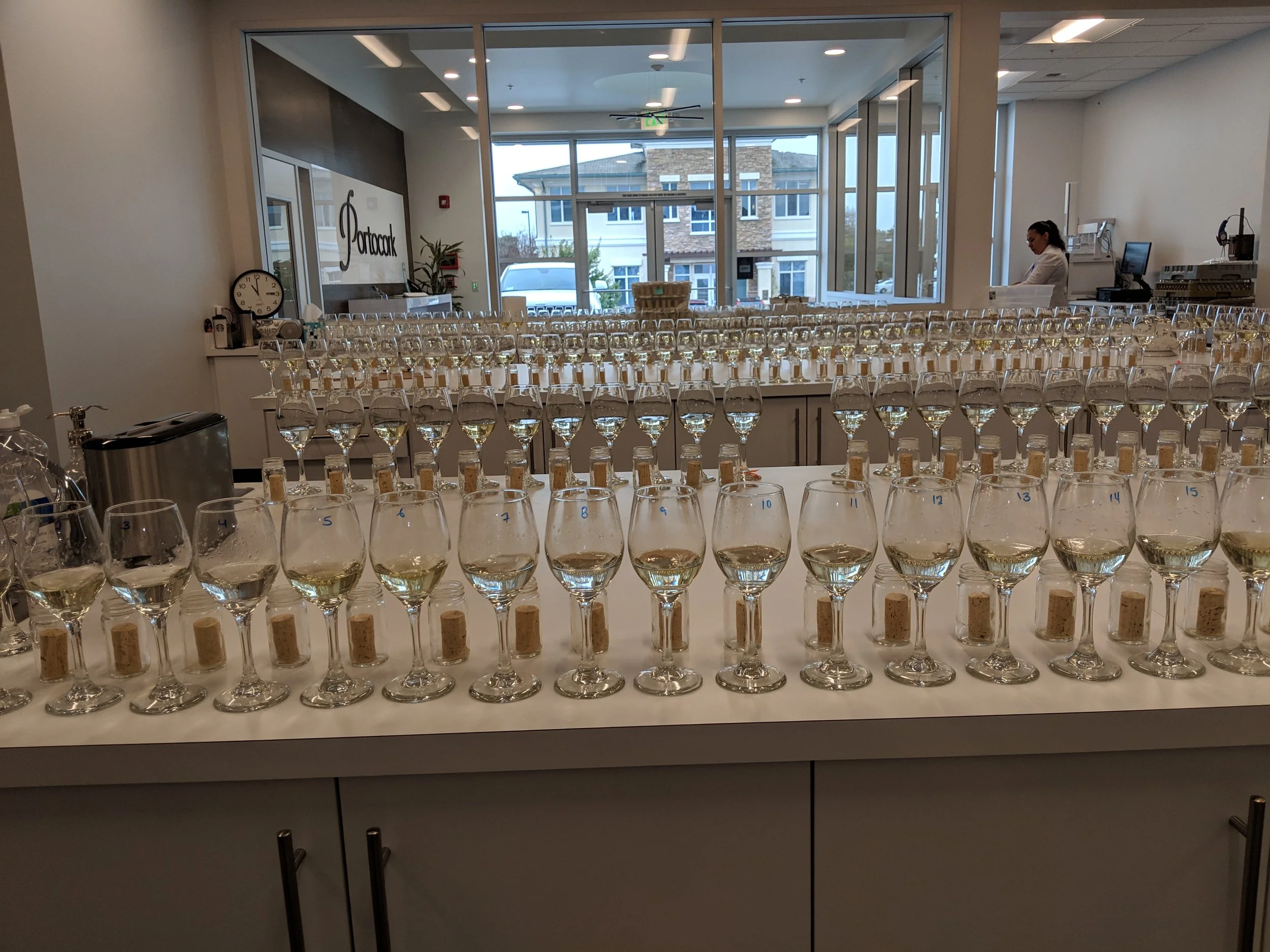 Large-scale wine sensory evaluation for cork taint detection and quality assurance in a commercial winery.
