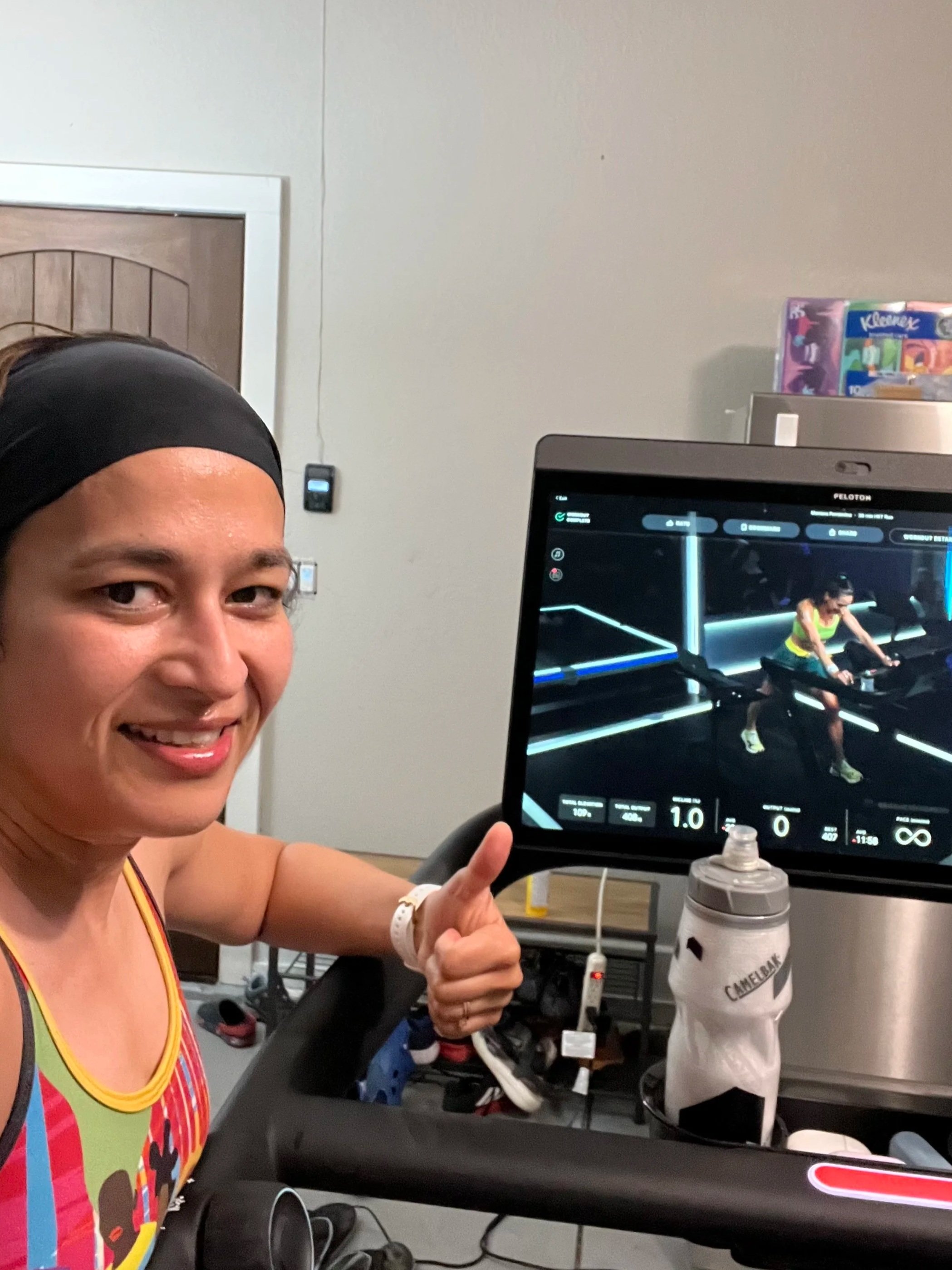 Twisha Anand, PhD, performing a high-intensity morning workout, representing the high-adrenaline 'hustle' phase that can lead to burnout and diminishing returns in both fitness and leadership.