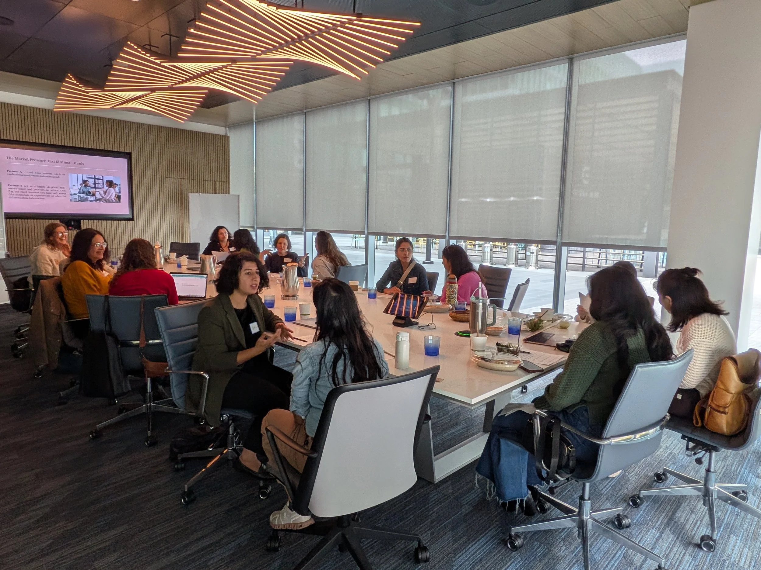 Diverse high-performance corporate executives and business founders networking during an outdoor summer mixer session in San Carlos, CA.