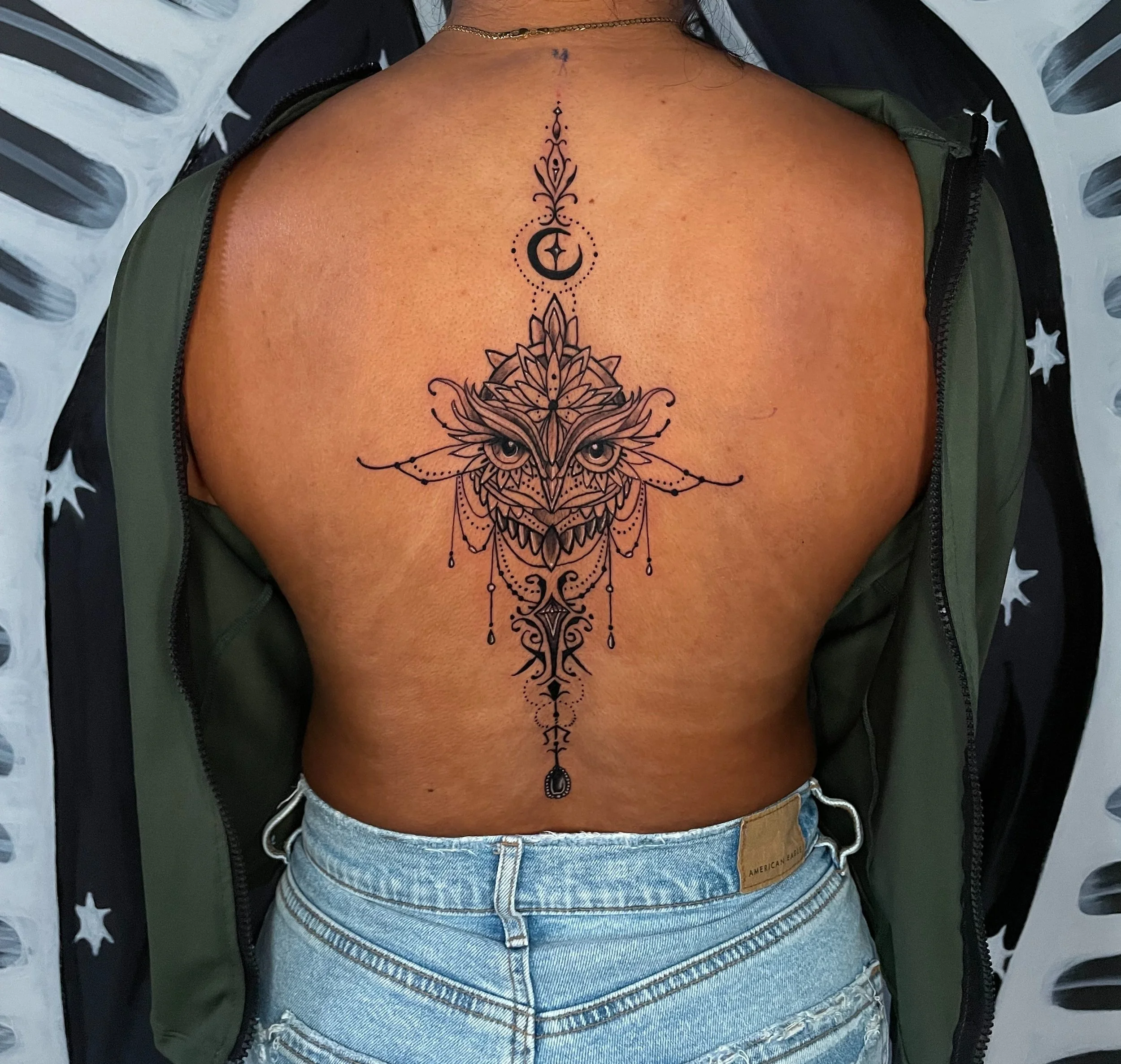 Fine line back tattoo by Austin Texas tattoo artist.