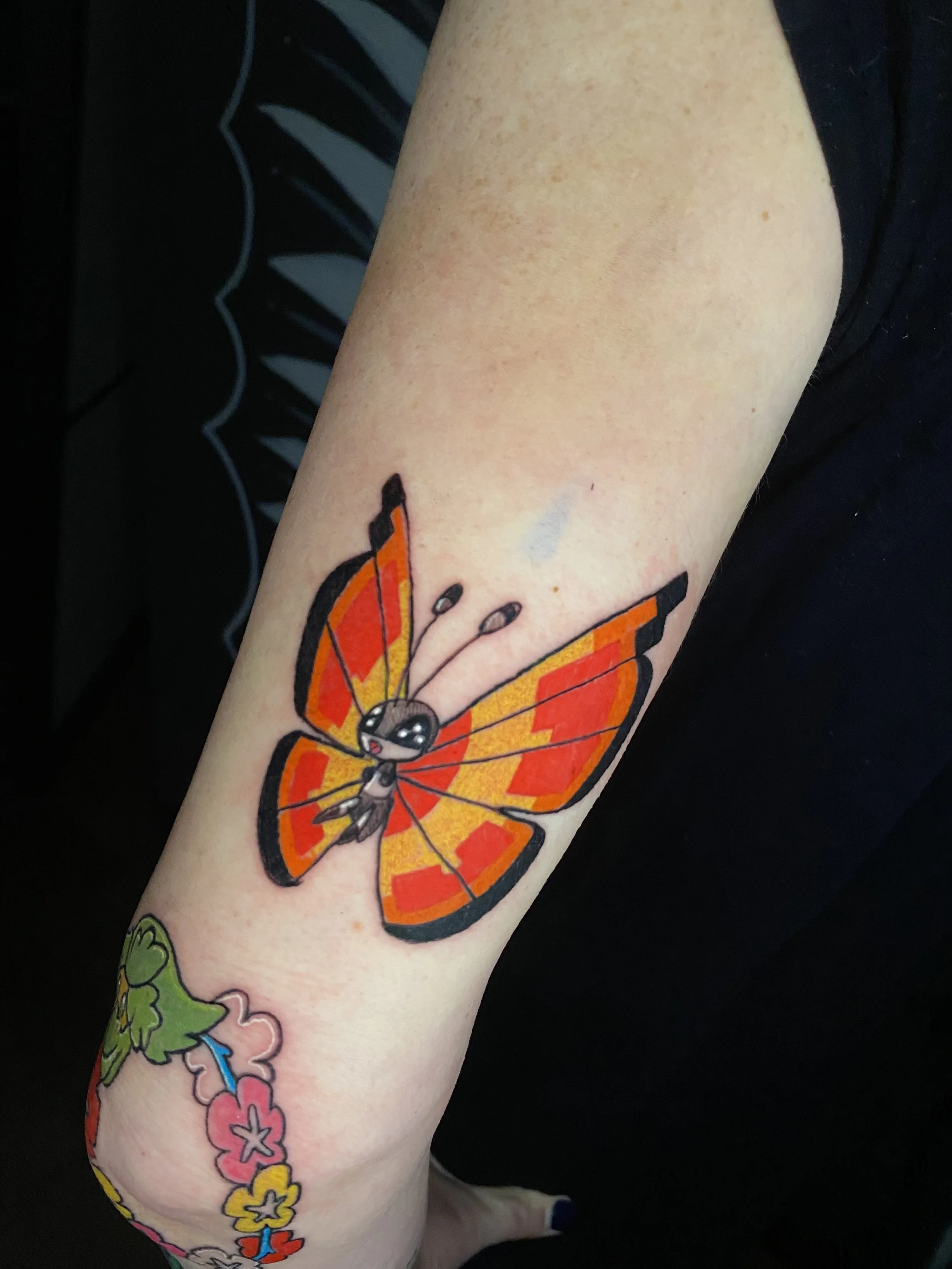 Bright color pokemon tattoo by Aaron LInaje. Done in Austin, Texas.  tattoo shops in austin tx best tattoo shops in austin, austin tattoo artists cheap tattoo shops in austin walk in tattoo shops austin