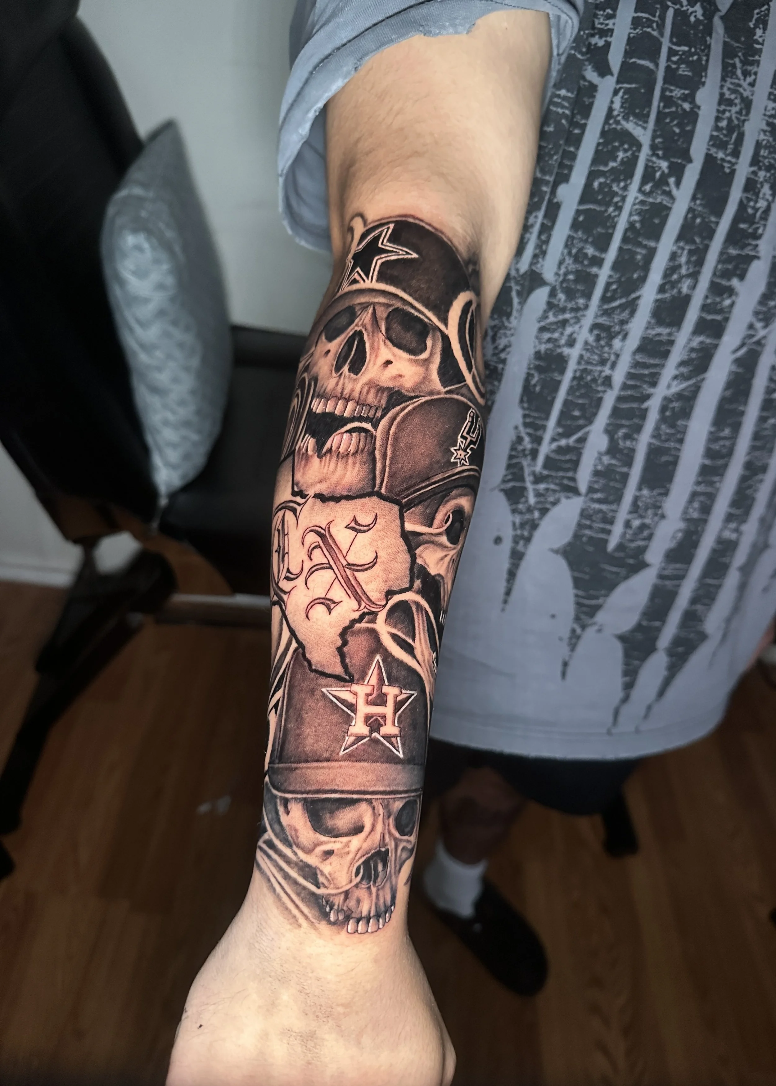 Texas style skulls tattoo done in black and grey realism by Oscar