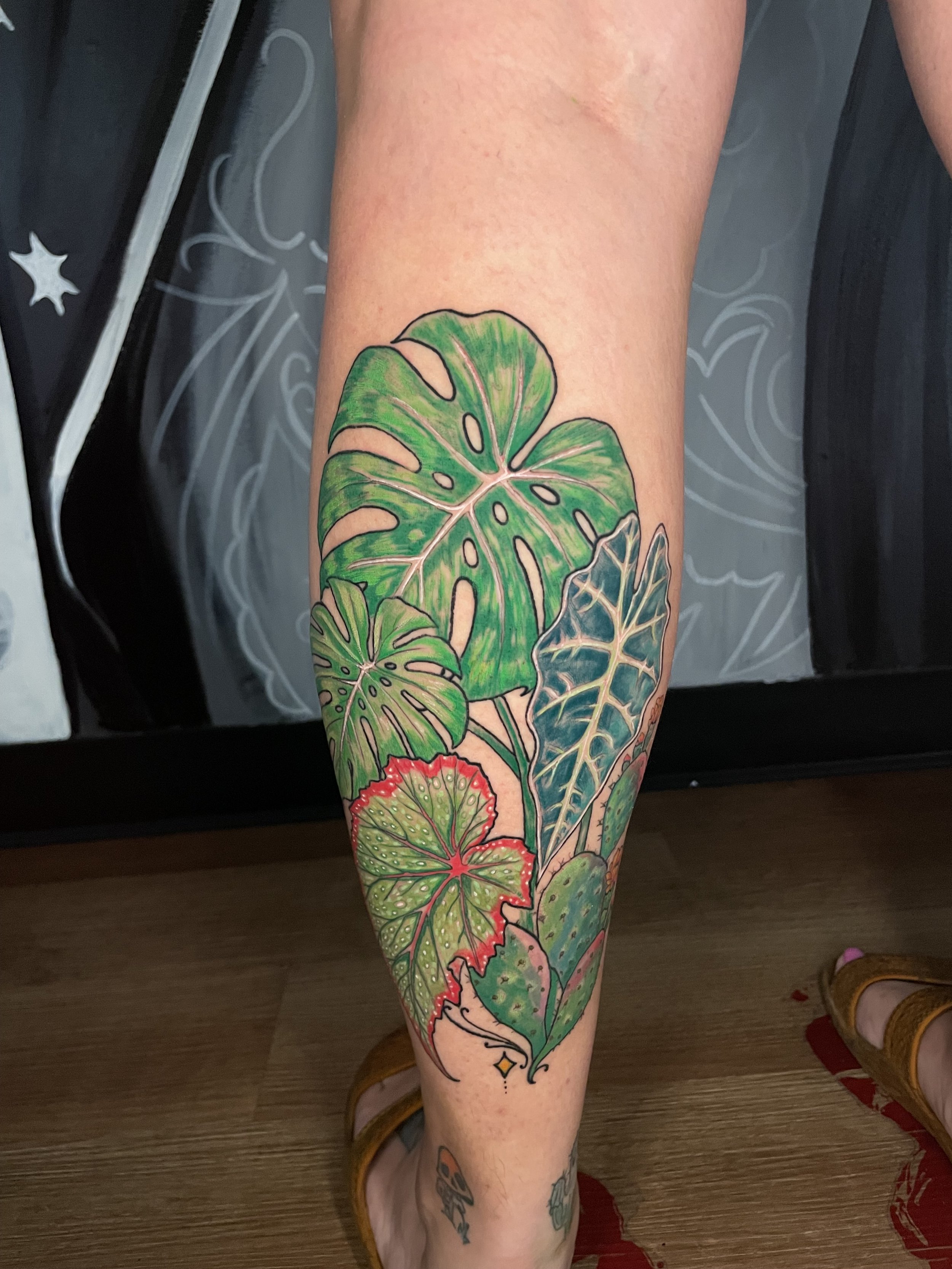 Bold colorful plant tattoo by @aaronlinajeart