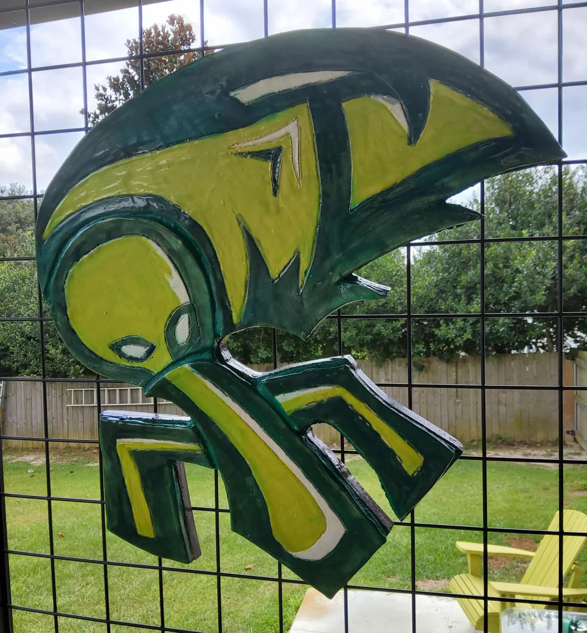 The Emerals Weevil $95 Size is 14.5" wide x 15" high Made of ceramic tile backed with wood for hanging
