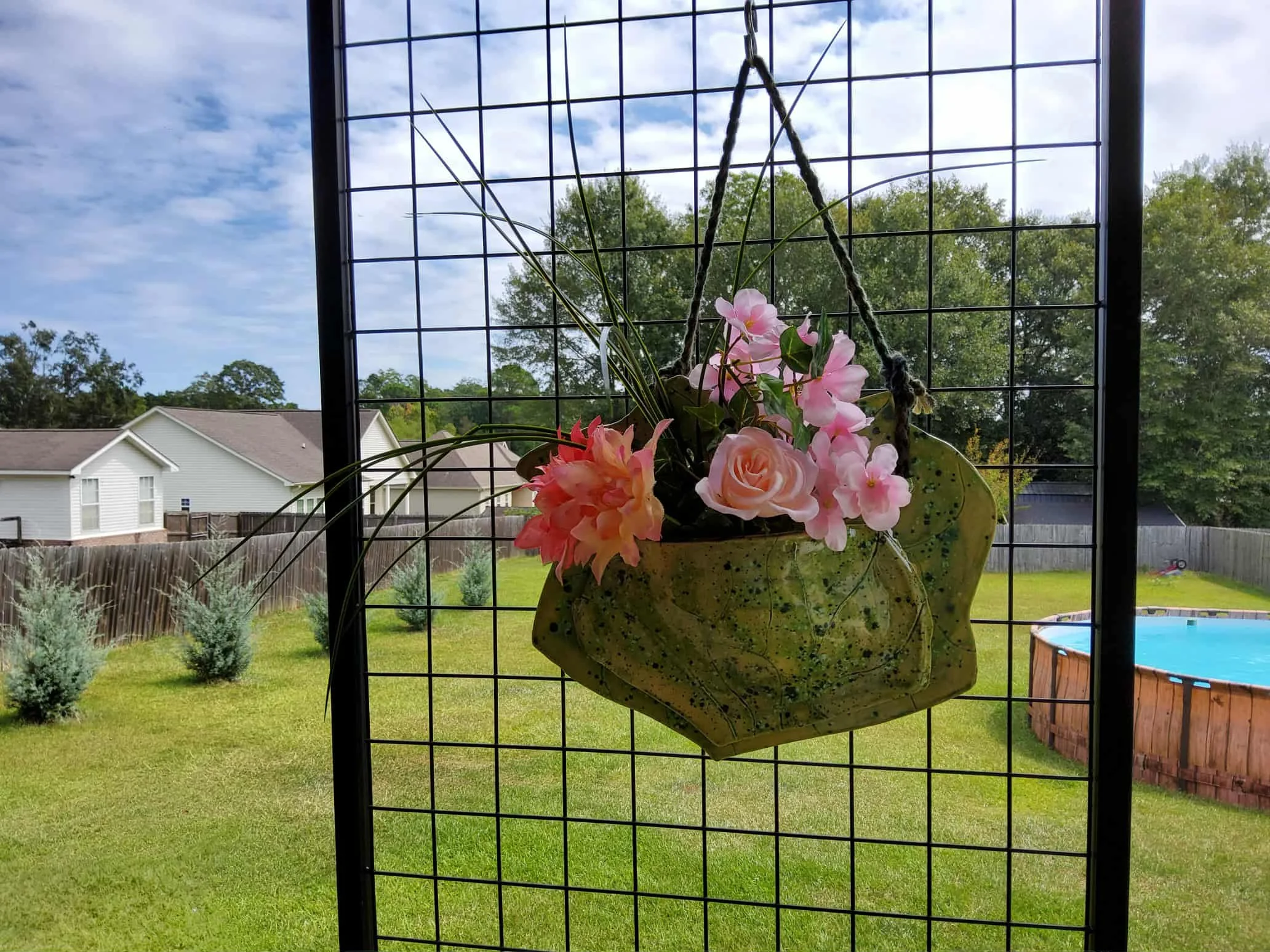Bloom Basket $55 Hanging Ceramic Basket Size is 12" wide x 10" high