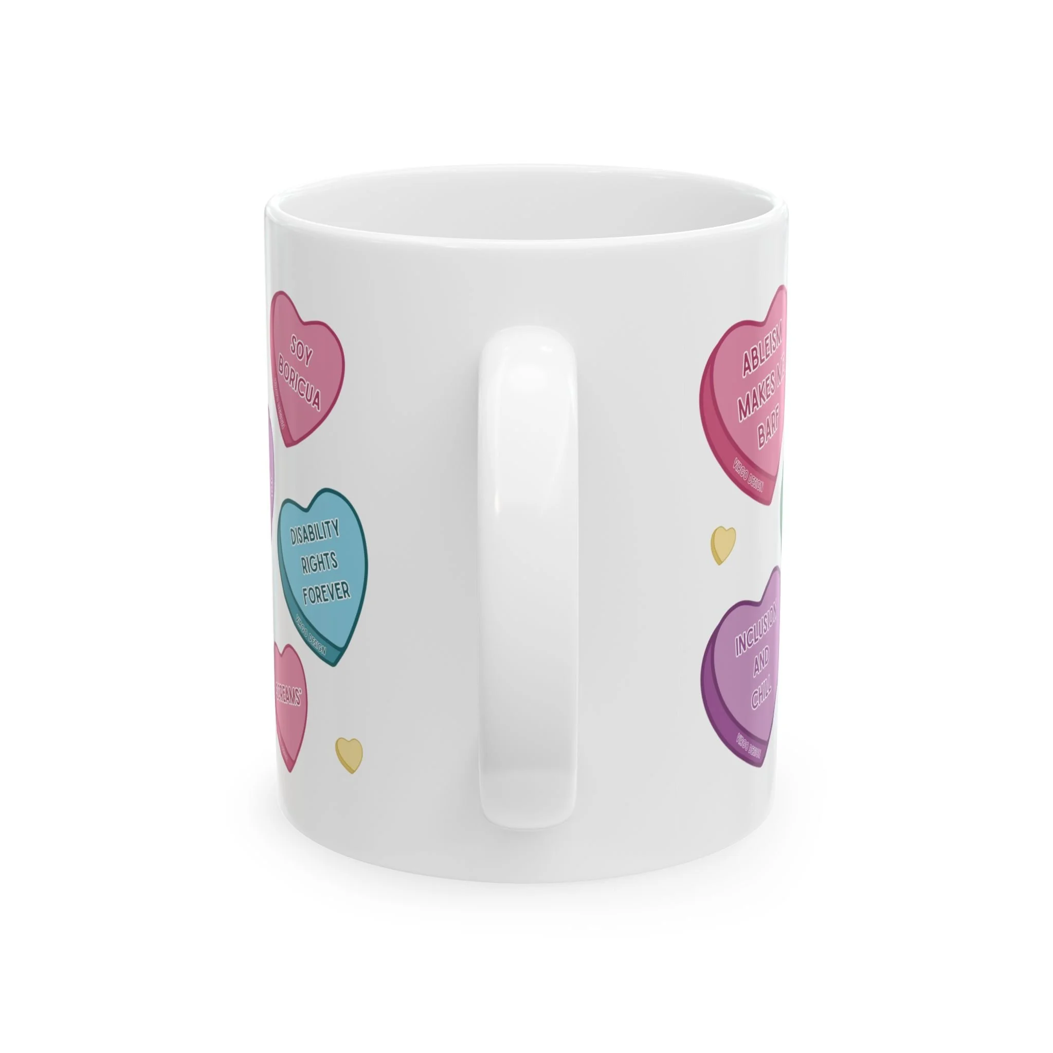 white ceramic mug with pink, blue, yellow, purple, and green advocacy messages on candy hearts