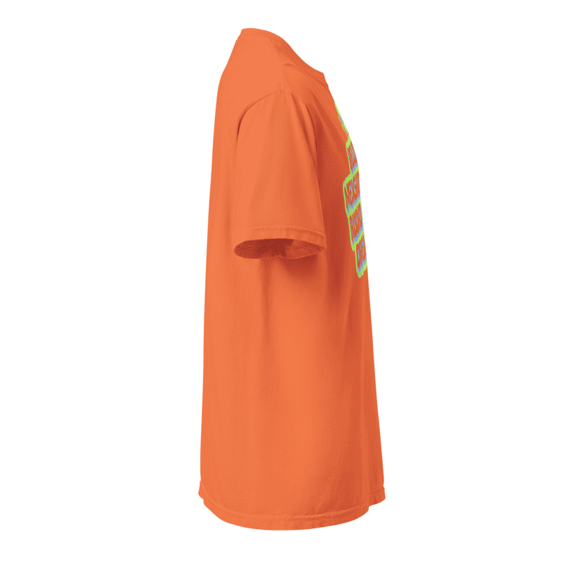 side profile view of orange Virgo Design shirt featuring a lime green alien and text that reads, "beloved neighborhood audhd weirdo dreamboat"