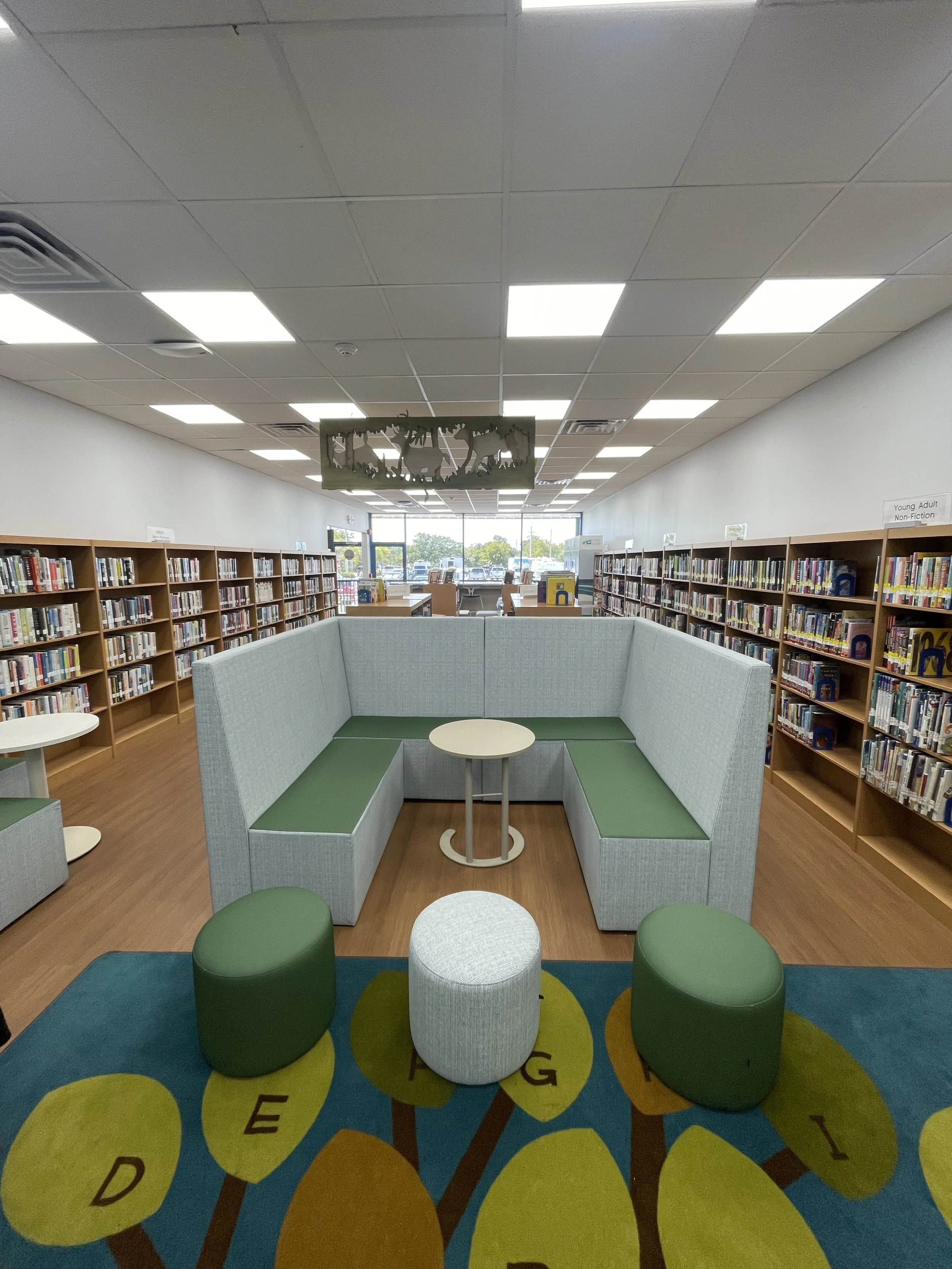 Study booth and stacks at the Big Pine Library