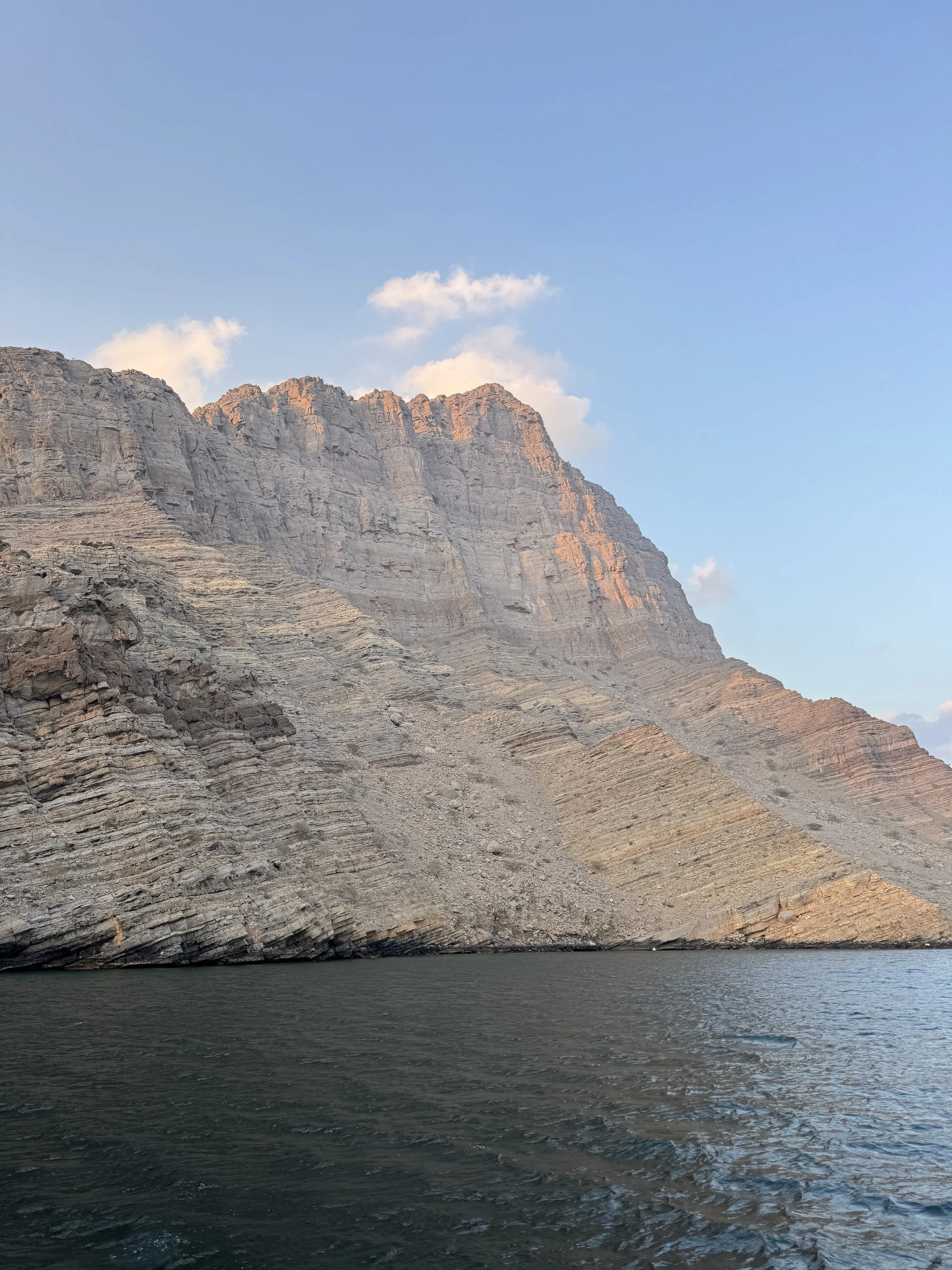 Pink and gold evening cliff