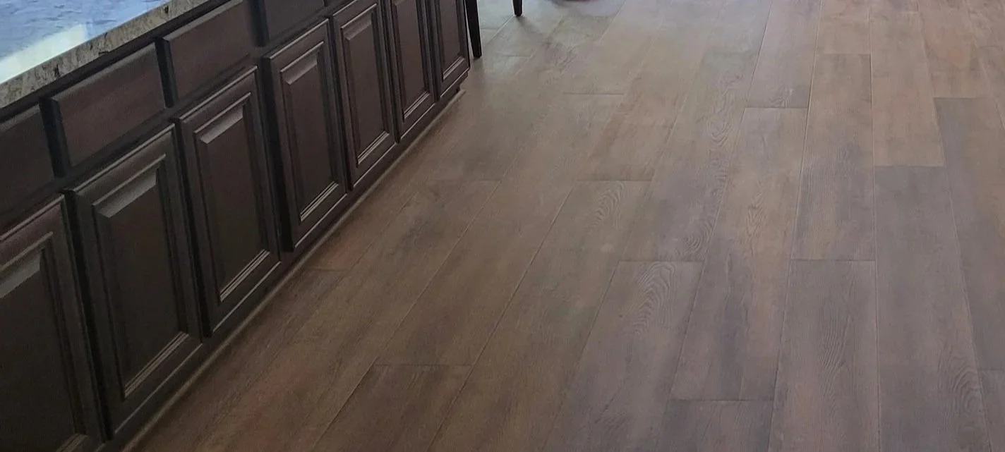 New luxury vinyl plank flooring installation complete.