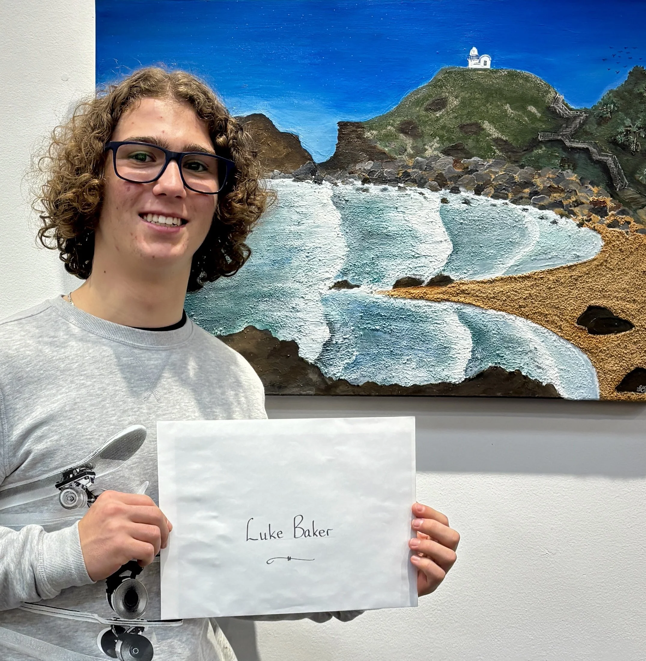 Luminance Young Artist 2025 winner Luke Baker with his artwork, Little Bay